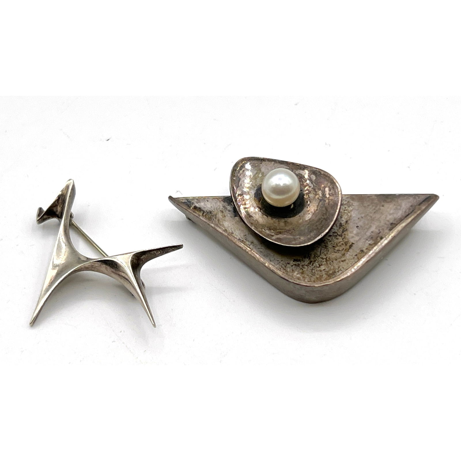 2pc MCM Studio Artist Sterling Pins. ED WIENER Modernist form with Pearl; Signed. 2) RONALD PEARSON (1 of 9)