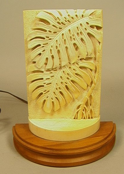 Large Hawaiian JOHN ROBERTS Carved Ivory Lamp. Si: Large Hawaiian JOHN ROBERTS Carved Ivory Lamp. Signed. Flat relief carved Image of two leaves. Wood Base with plastic back. Signed.-- Dimensions: H: 9.75 inches: W: 7.5 inches --- US Shipping charge: 