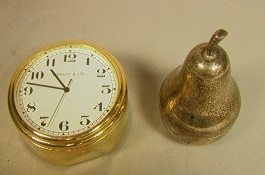 2pc TIFFANY & CO lot. Sterling Pear Shaped Box. G: 2pc TIFFANY & CO lot. Sterling Pear Shaped Box. Gold Metal Small Dresser Clock. Both Marked.-- Dimensions: H: 2.25 inches --- US Shipping charge: $14