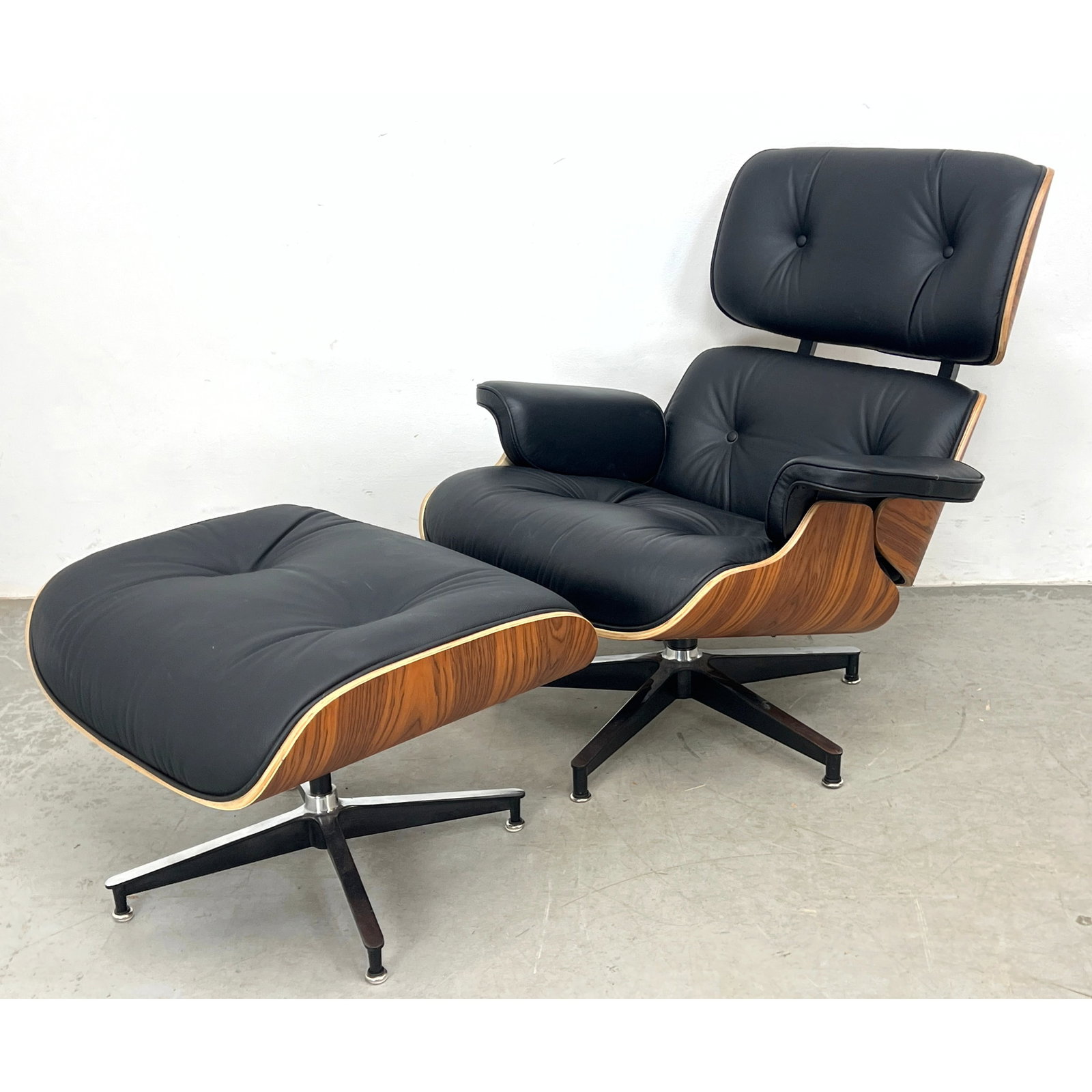 Eames style lounge chair and matching ottoman. (1 of 11)