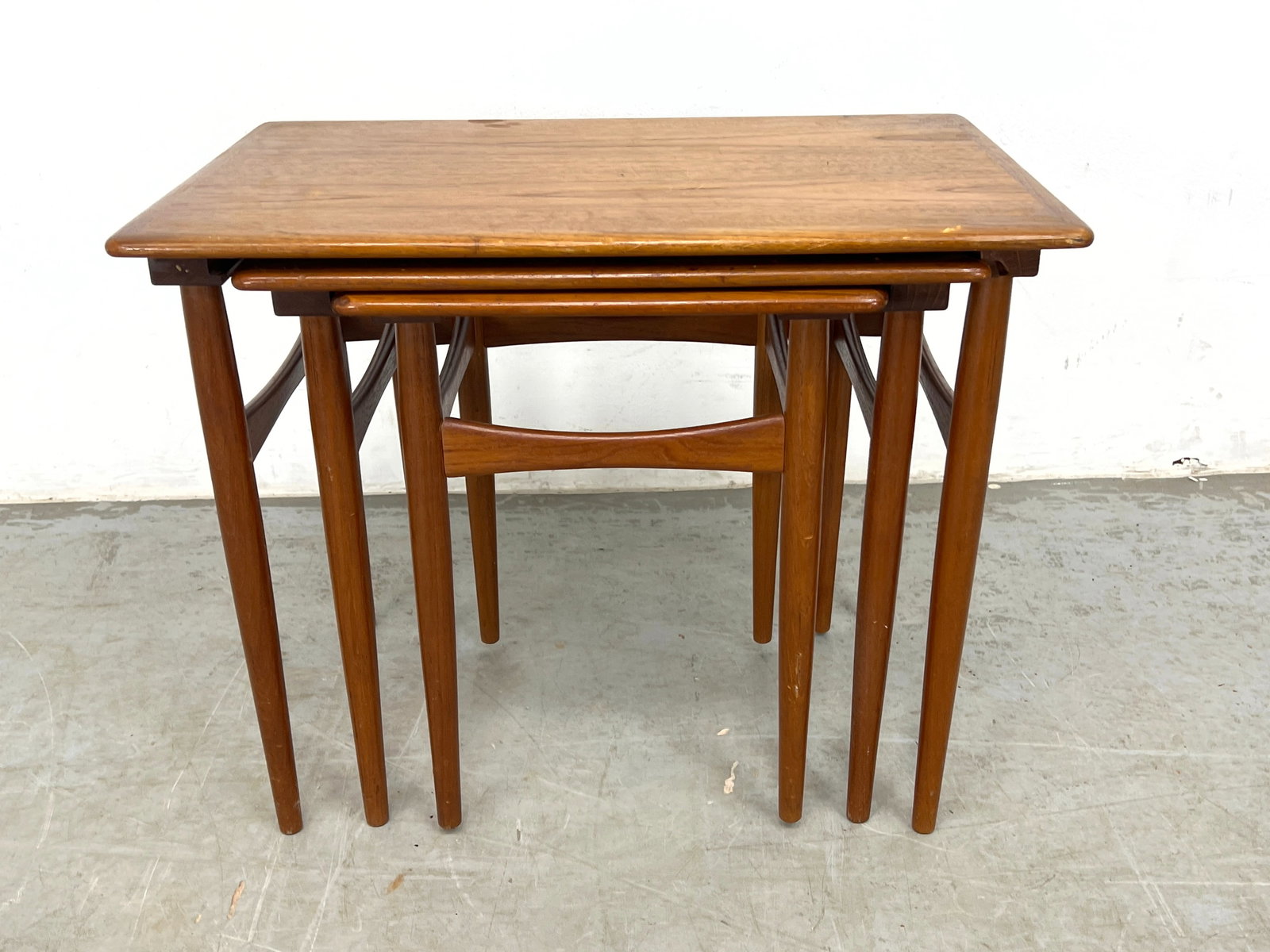 Set 3 Danish Teak Modern Nesting Tables. Banded Tops on Long tapered Legs with Bowtie form stretcher (1 of 8)