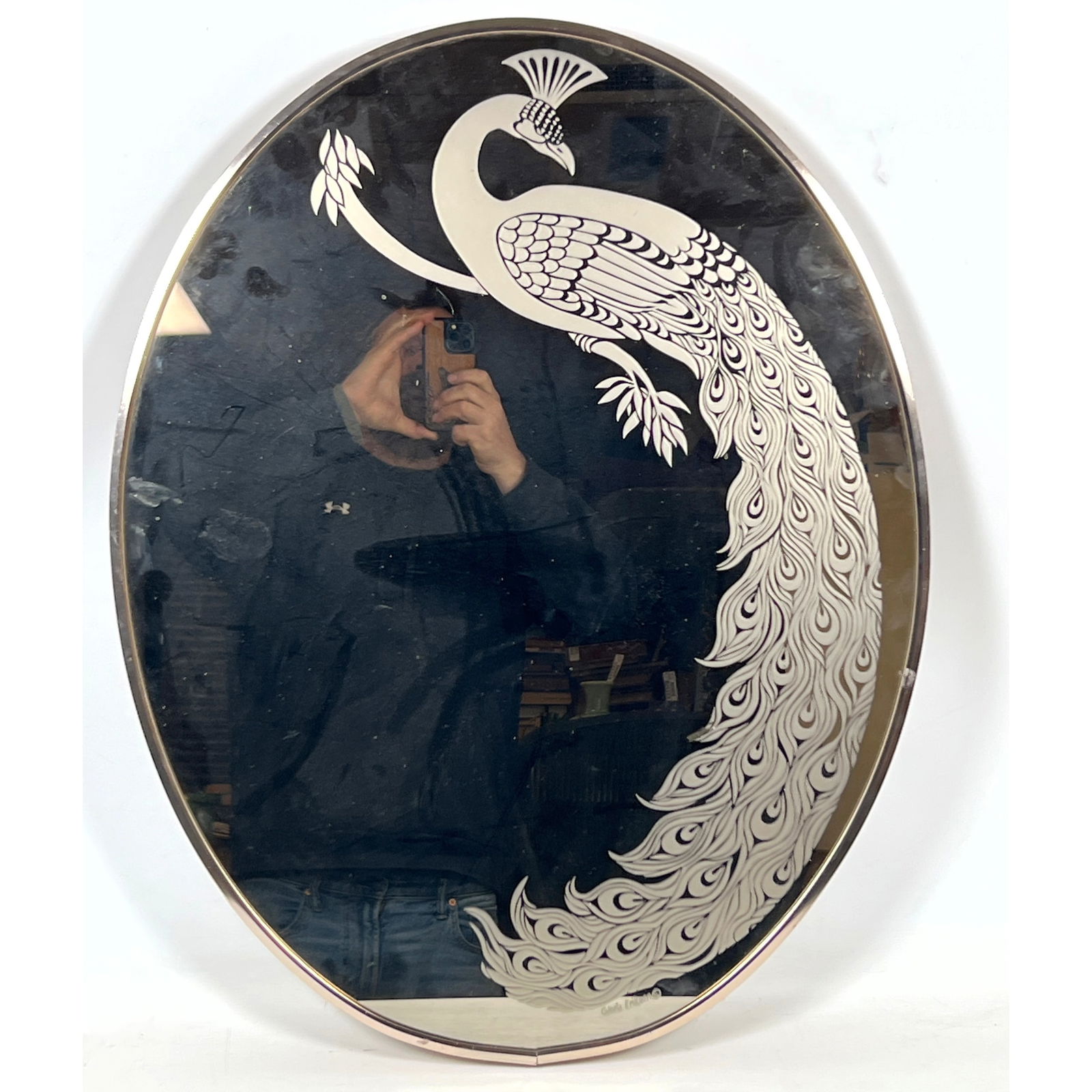 GLORIA ERIKSEN Etched Peacock Oval Mirror. Thin Metal Framed. Artist Signed.: GLORIA ERIKSEN Etched Peacock Oval Mirror. Thin Metal Framed. Artist Signed. Dimensions: Height: 28 inches, Width: 22 inches. --- US Packing and Shipping charge: In house shipping available. Will be c