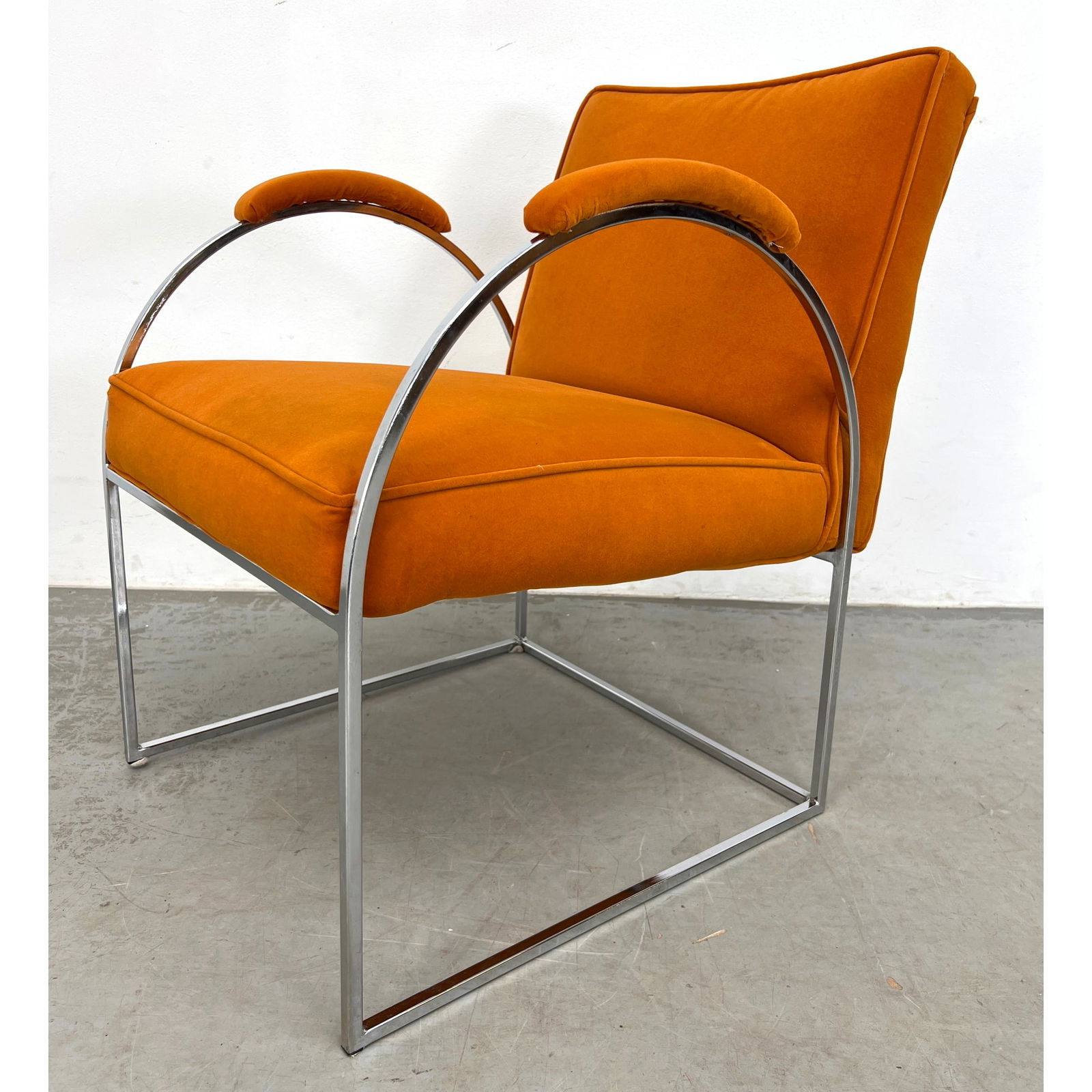 Orange Chrome side chair with arched arms. Milo Baughman style. Unmarked. Arc-shaped armrests extend (1 of 8)