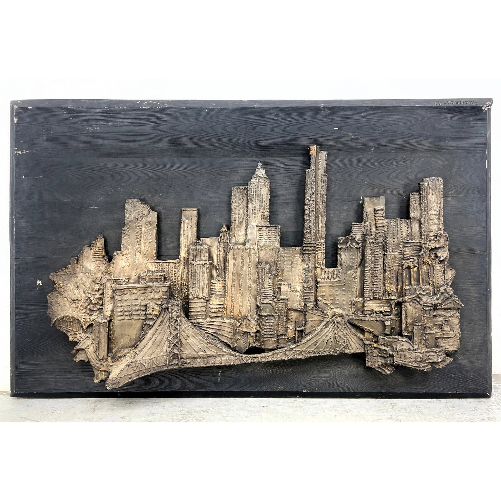 Brutalist New York City skyline wall sculpture. Finesseorg fiberglass. Signed.: Brutalist New York City skyline wall sculpture. Finesseorg fiberglass. Signed. Dimensions: Height: 38 inches, Width: 59.5 inches, Depth: 6.5 inches. --- - We offer curbside delivery for most items to