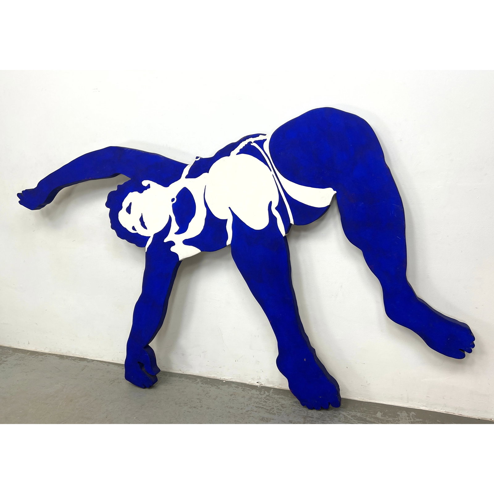 FRANK M HERZ Figural Wall Sculpture. Painted Plywood. Acrobatic Dancer Pose. Rich Cobalt Blue and Wh: FRANK M HERZ Figural Wall Sculpture. Painted Plywood. Acrobatic Dancer Pose. Rich Cobalt Blue and White Painted Surface. Has some depth. Signed and dated 1975 on reverse. Dimensions: Height: 58 inches