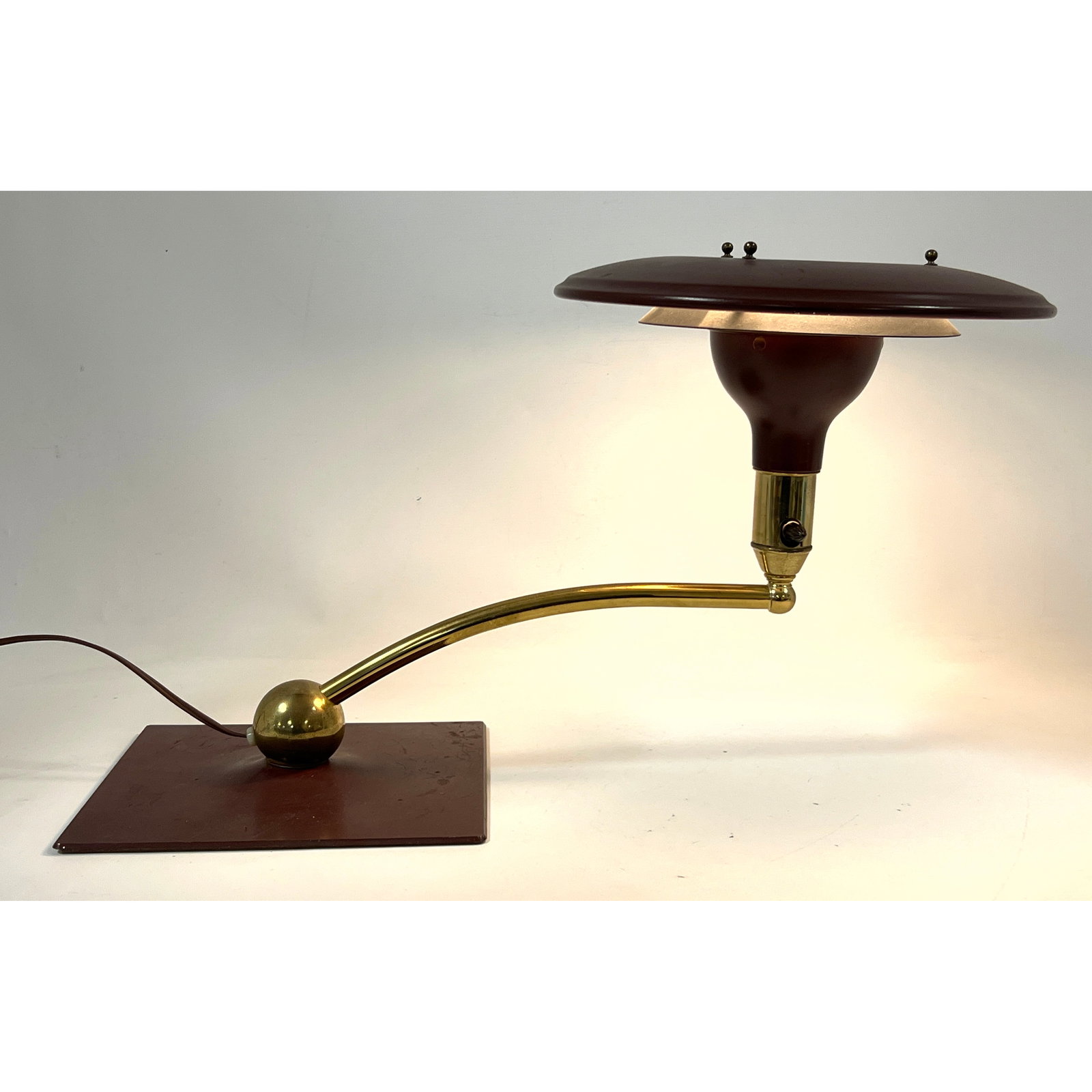 Mid Century Modern Wheeler Attributed Sight Light or Flying Saucer Desk Lamp.: Mid Century Modern Wheeler Attributed Sight Light or Flying Saucer Desk Lamp. Dimensions: Height: 13 inches, Width: 22.5 inches, Depth: 12 inches. --- - We offer curbside delivery for most items to NY