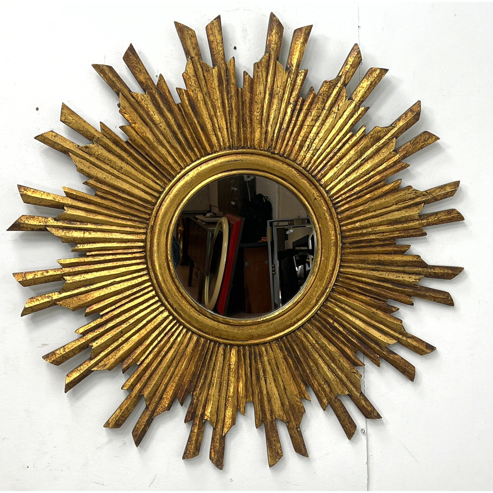 Decorator Sunburst Gilt finish Wall Mirror. Angled faceted rays emanate from round central mirror. C (1 of 9)
