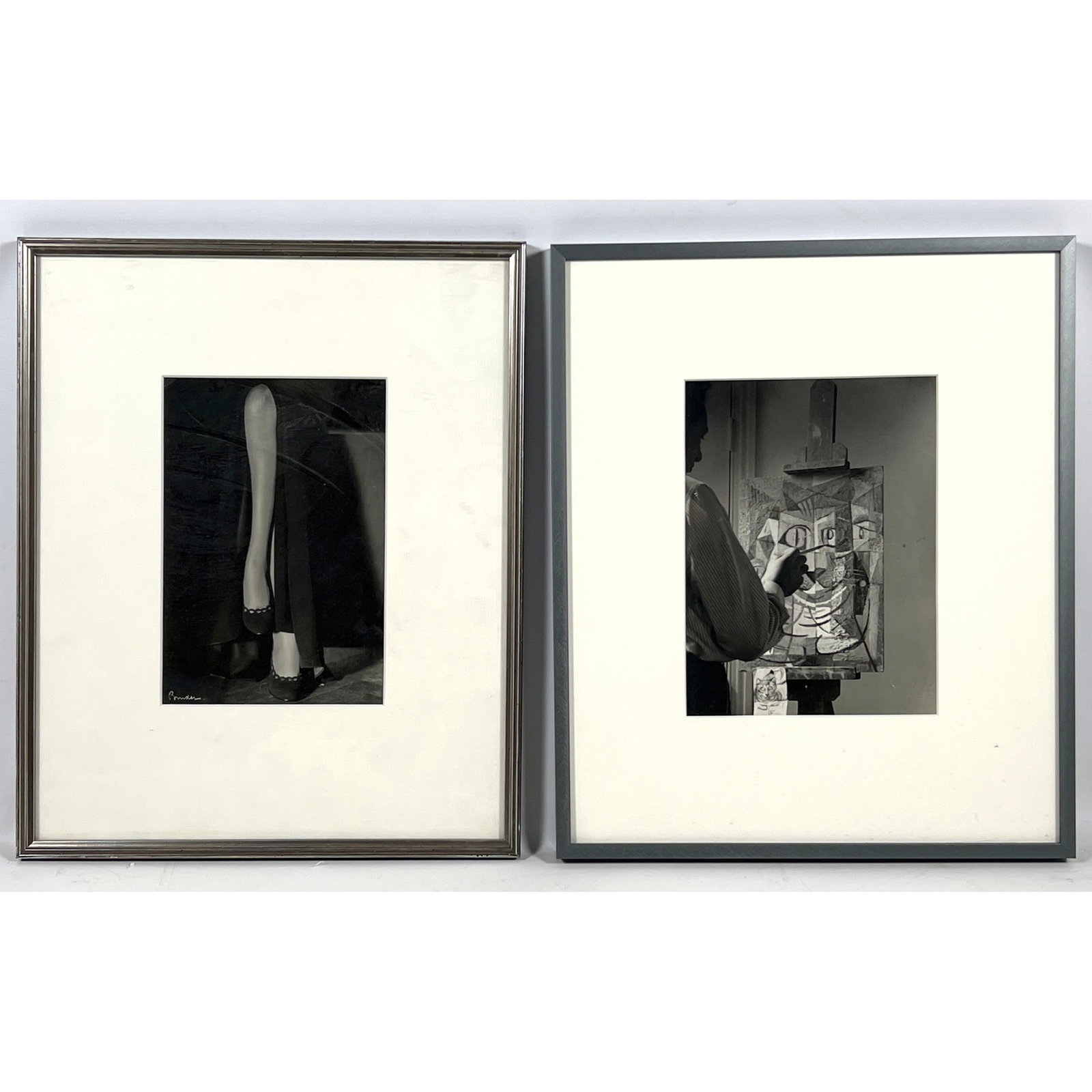 2pcs Black and White Photographs. Alexander Binder Fashion Photo of Legs. Picasso in Studio with cat: 2pcs Black and White Photographs. Alexander Binder Fashion Photo of Legs. Picasso in Studio with cat Painting. Dimensions: Frame Height: 17 inches, Frame Width: 14 inches. - Image Size: Image Height: