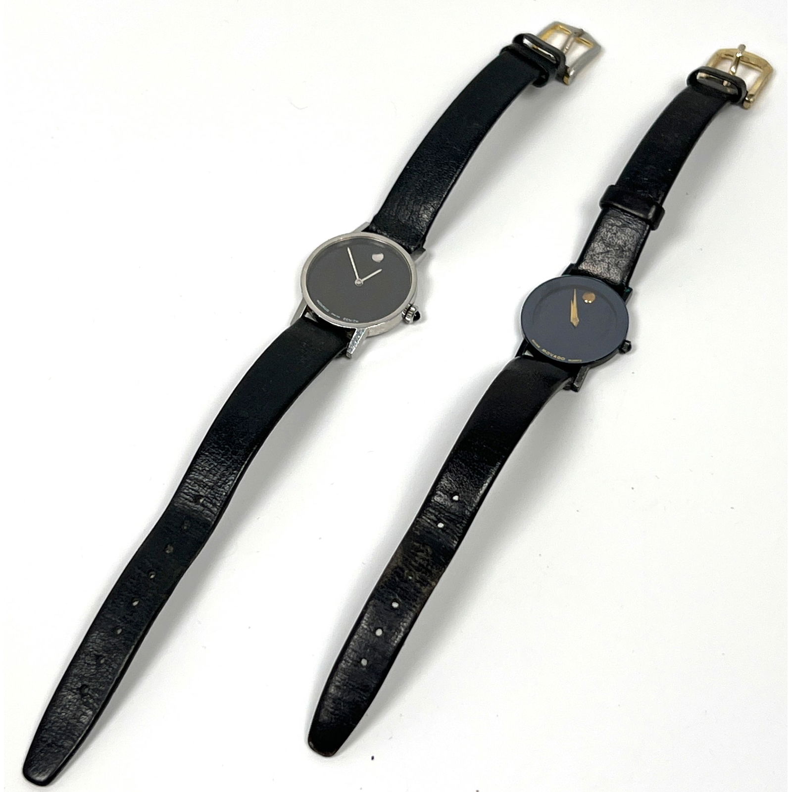 2pc MOVADO Museum Classic Woman's Watch. One has Stainless Steel Case.: 2pc MOVADO Museum Classic Woman's Watch. One has Stainless Steel Case. Dimensions: Height: 7.75 inches, Width: 1 inches, Depth: .25 inches. --- US Packing and Shipping charge: Jewelry: $20 first item.