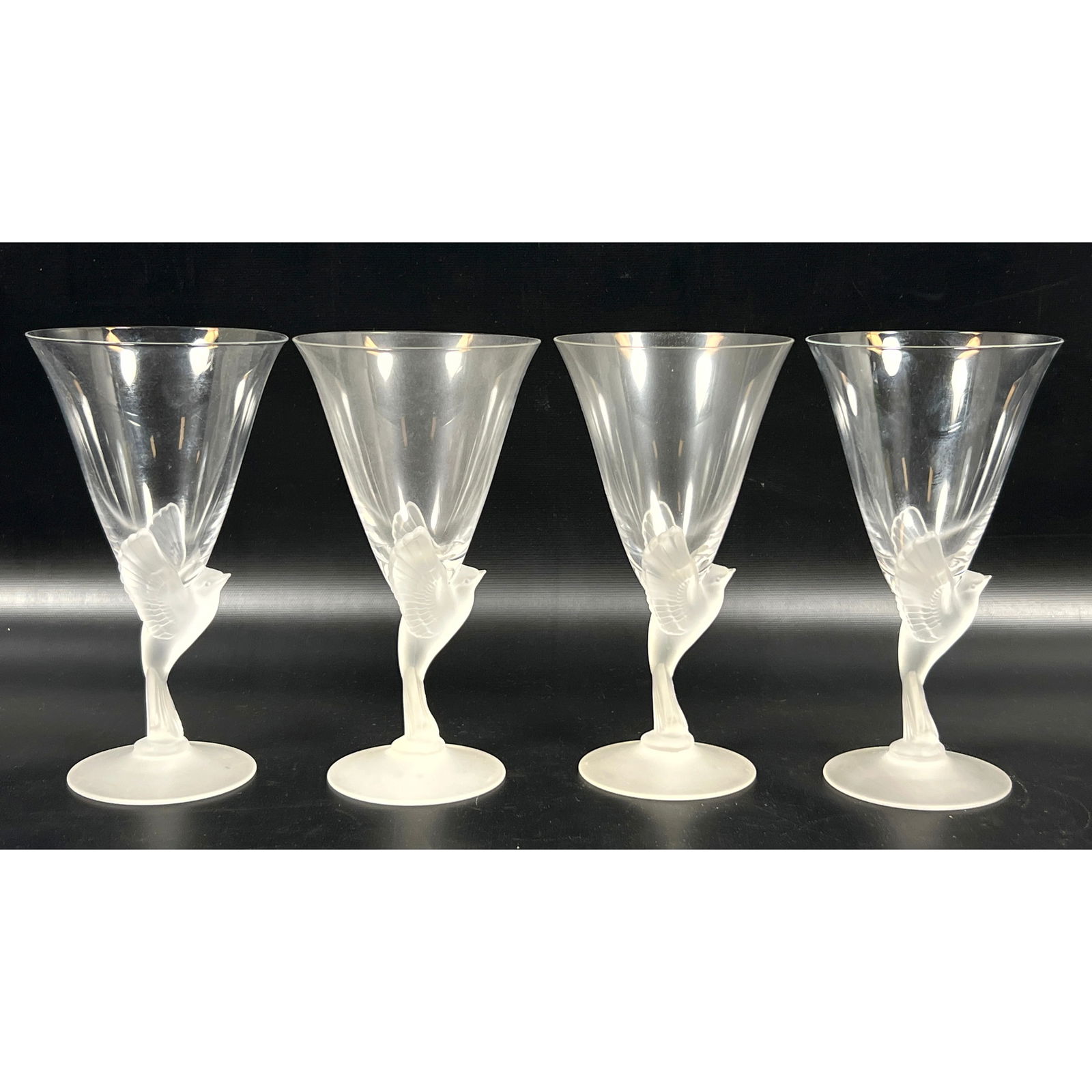 Set 4 Sasaki Crystal, Japan, in the Wings pattern.: Set 4 Sasaki Crystal, Japan, in the Wings pattern. Dimensions: Height: 7.5 inches, Width: 4 inches, Depth: 4 inches. --- US Packing and Shipping charge: In house shipping available. Will be calculated