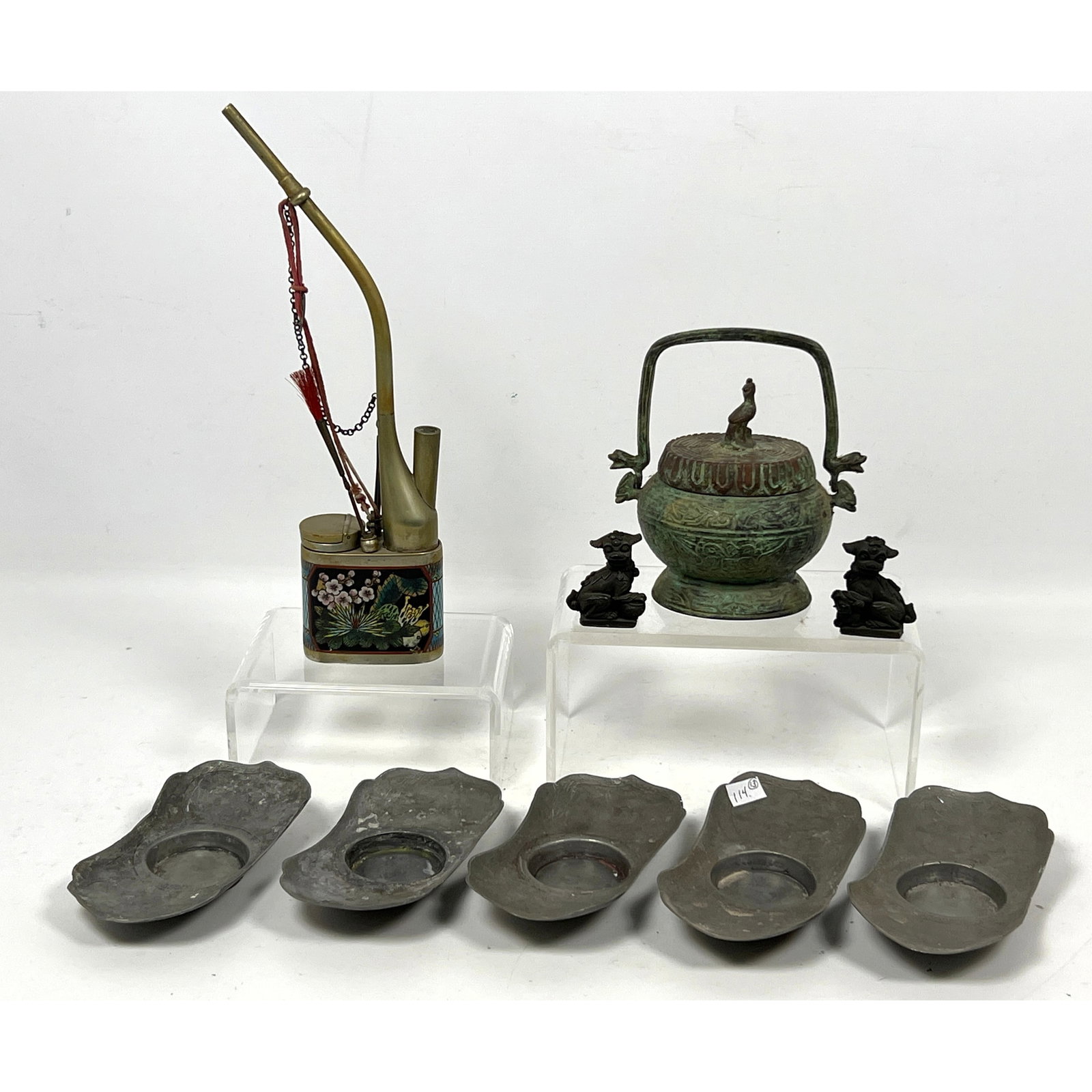 9pcs Mixed Asian metalware. Foo Dog Figures, Candle boats, Pipe.: 9pcs Mixed Asian metalware. Foo Dog Figures, Candle boats, Pipe. Dimensions: Height: 12 inches, Width: 3 inches, Depth: 1.25 inches. --- US Packing and Shipping charge: In house shipping