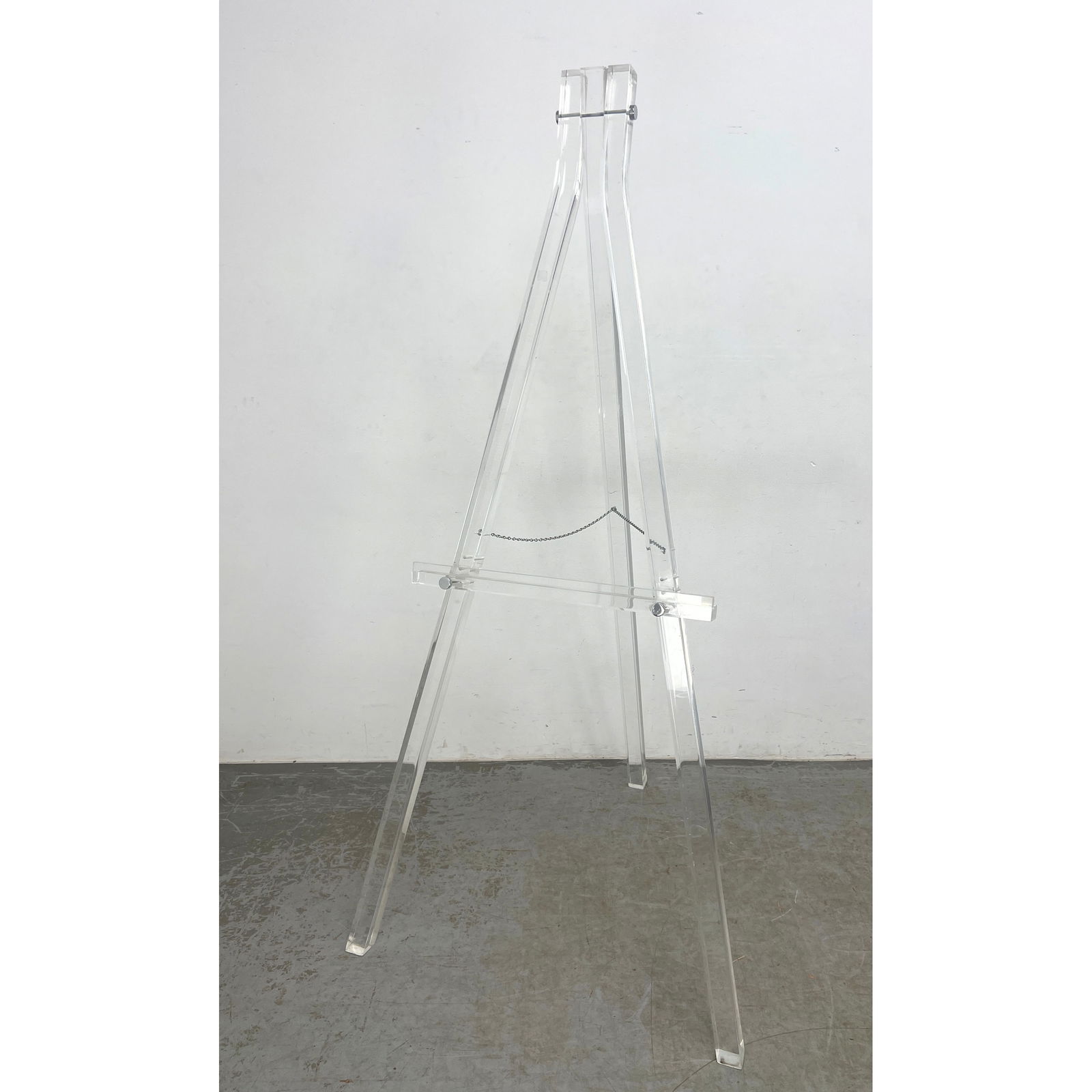 Contemporary Tall Lucite Artist's Display Easel. Tripod; Sturdy Thick Lucite Legs. Minimalist aesthe: Contemporary Tall Lucite Artist's Display Easel. Tripod; Sturdy Thick Lucite Legs. Minimalist aesthetic suitable for gallery or residential display. Dimensions: Height: 69.5 inches, Width: 34 inches,