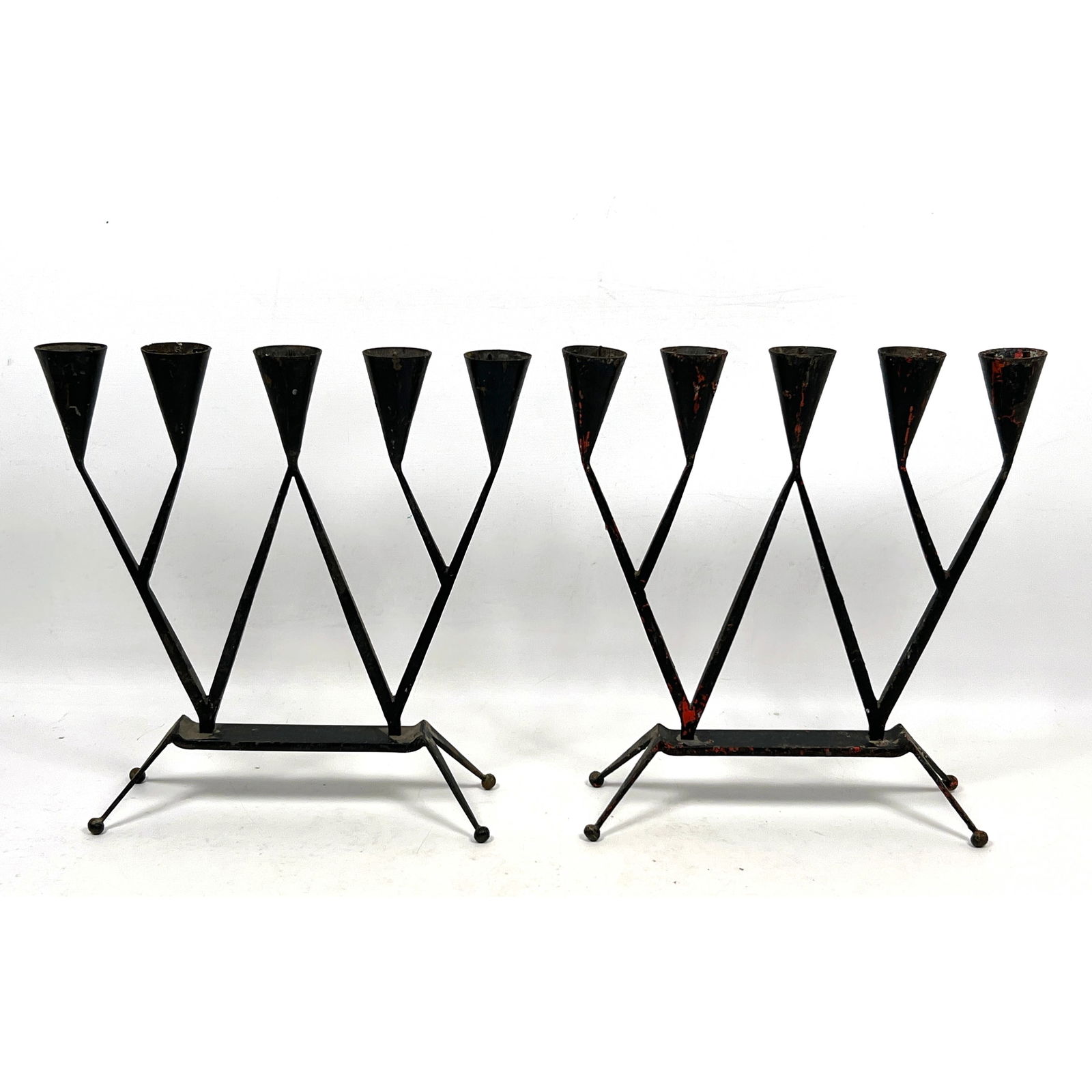 Pr German Wrought Iron 5 Candle Candelabra. In style of Ambrose Heal design. Angular Design Forms su: Pr German Wrought Iron 5 Candle Candelabra. In style of Ambrose Heal design. Angular Design Forms support Cone Shaped Candle Holders. Marked HBV in Shield Stamp. Germany. Dimensions: Height: 11.5 inch
