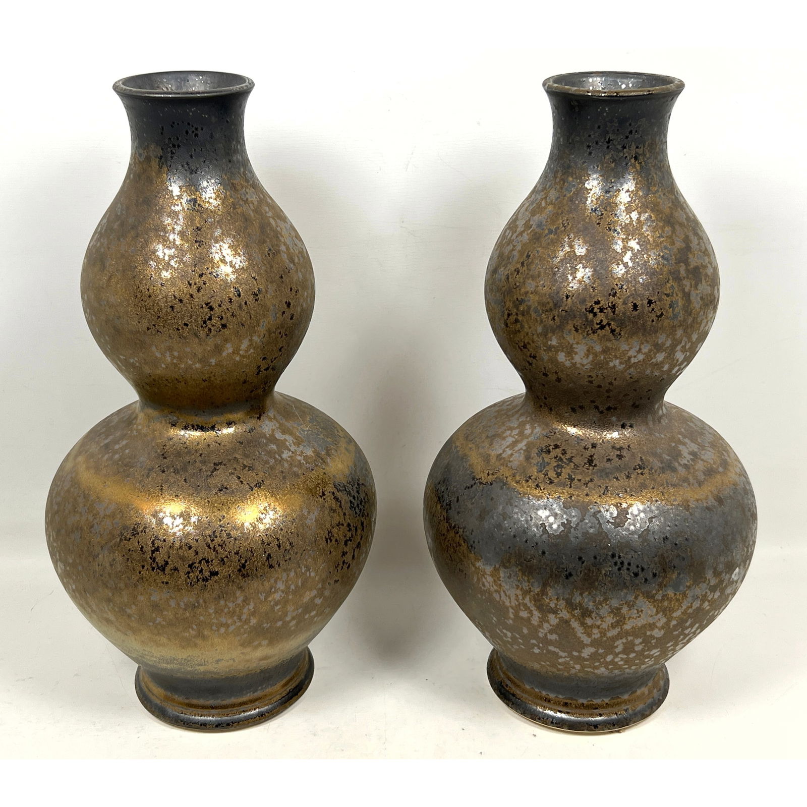 2pc Double Gourd form Metallic Glaze Vases. Nice form highlights unusual glaze. Unmarked.: 2pc Double Gourd form Metallic Glaze Vases. Nice form highlights unusual glaze. Unmarked. Dimensions: Height: 18 inches, Width: 8.5 inches, Depth: 8.5 inches. --- US Packing and Shipping charge: In ho