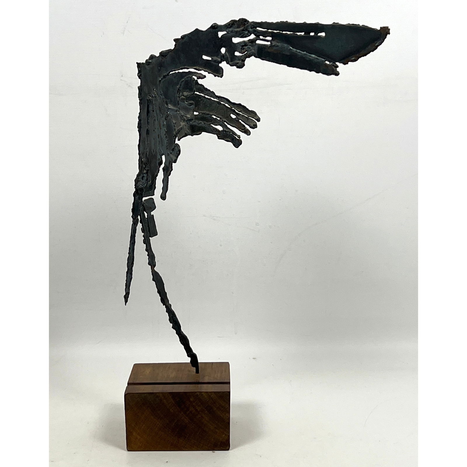 Vintage Brutalist Torch Cut Metal Winged Form Table Sculpture. Wood Base.: Vintage Brutalist Torch Cut Metal Winged Form Table Sculpture. Wood Base. Dimensions: Height: 14.5 inches, Width: 5 inches, Depth: 9 inches. --- US Packing and Shipping charge: In house shipping avail