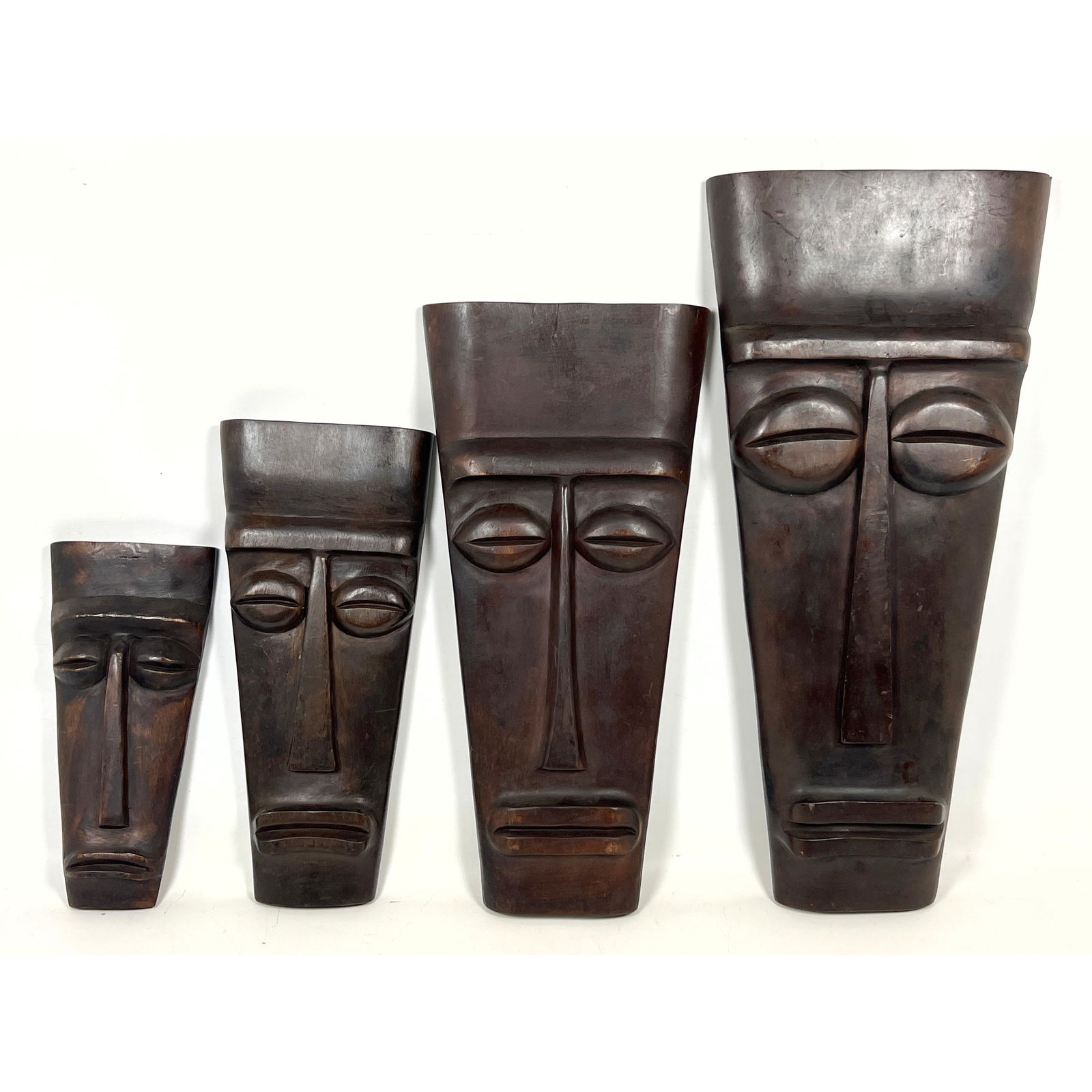 4pcs Graduated hand-carved decorative wooden masks, designed in a modernist style resembling West Af (1 of 14)