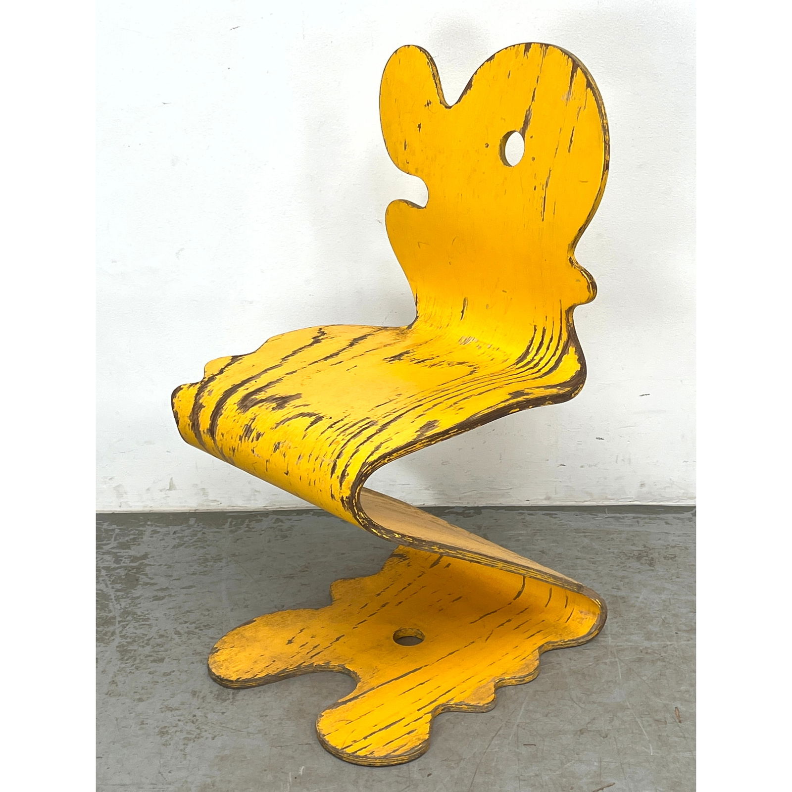 Verner PantonPantonic Chair. Yellow finished molded wood chair. Weathered finish.: Verner PantonPantonic Chair. Yellow finished molded wood chair. Weathered finish. Dimensions: Height: 36.5 inches, Width: 18 inches, Depth: 20 inches. - Seat Height: 18 inches ---