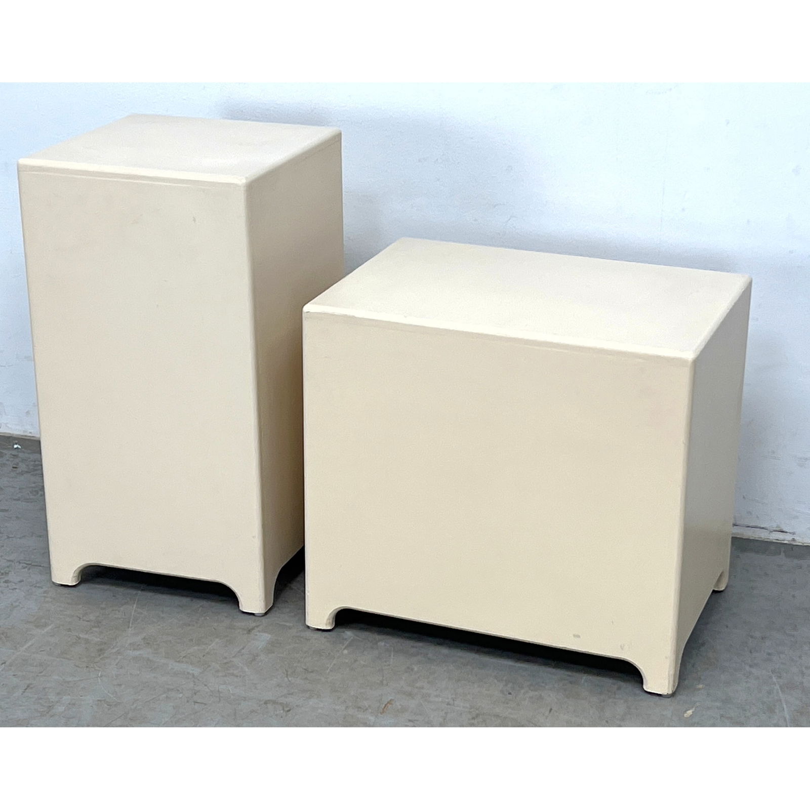2pcs Display pedestals of minimalist modern design. Painted finish.: 2pcs Display pedestals of minimalist modern design. Painted finish. Dimensions: Height: 24 inches, Width: 13 inches, Depth: 13 inches. - Additional Dimensions: Smaller H: 18 inches, W: 20 inches, D: 1