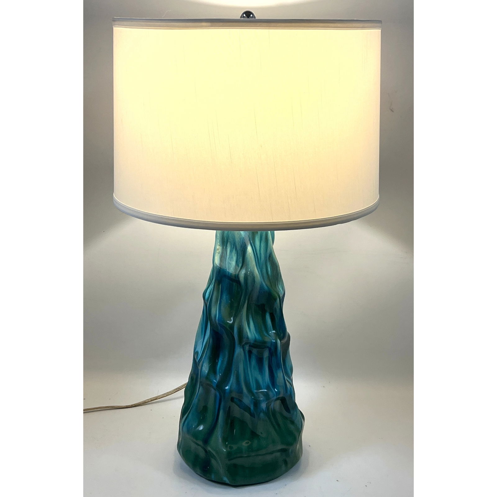 Salt Water Taffy Table Lamp. Sculptural Undulating form Pottery has Turquoise, Green and Blue Glaz: Salt Water Taffy Table Lamp. Sculptural Undulating form Pottery has Turquoise, Green and Blue Glaze. Pacific Coast Lighting. Mid Century Modern Dimensions: Height: 30 inches, Width: 17.5 inches,