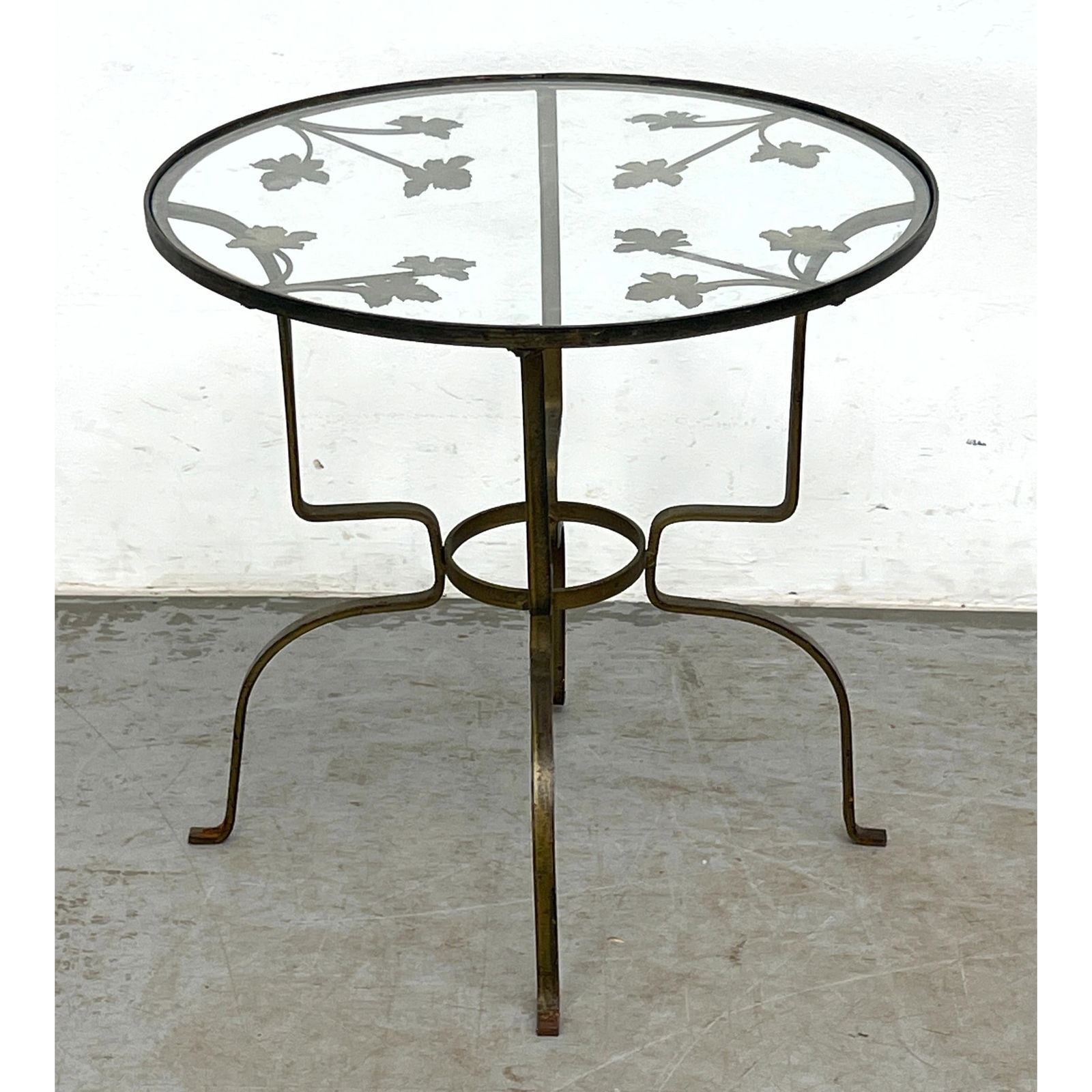 Glass top Iron garden table: Glass top Iron garden table Dimensions: Height: 18.5 inches, Width: 18.5 inches, Depth: 18.5 inches. ---