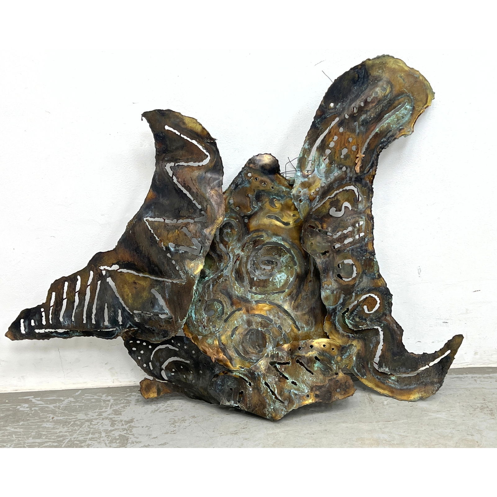 Large Torch Cut, Welded Metal Wall Sculpture. Green Oxidized finish. Brutalist: Large Torch Cut, Welded Metal Wall Sculpture. Green Oxidized finish. Brutalist Dimensions: Height: 35 inches, Width: 46 inches, Depth: 11 inches. ---