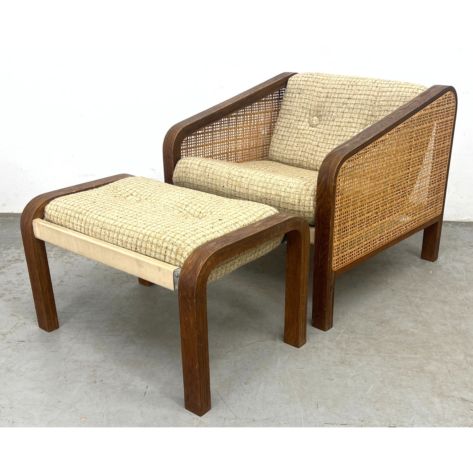 Mid Century Modern Bent wood Lounge Chair and Ottoman. Oak and Rattan Cane Scandinavian Lounge Chair: Mid Century Modern Bent wood Lounge Chair and Ottoman. Oak and Rattan Cane Scandinavian Lounge Chair and Ottoman. Dimensions: Height: 25.5 inches, Width: 26.5 inches, Depth: 29.5 inches. - Seat