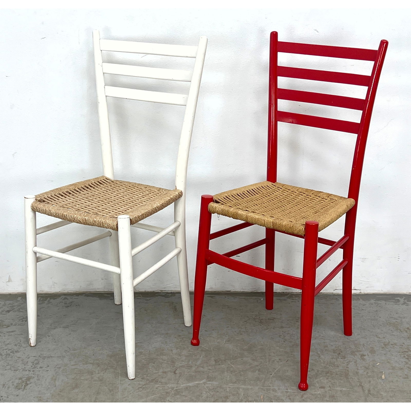 2 Vintage Italian Painted Wood Ladder Back Chairs with Woven Seats.: 2 Vintage Italian Painted Wood Ladder Back Chairs with Woven Seats. Dimensions: Height: 36.5 inches, Width: 16.5 inches, Depth: 14 inches. ---