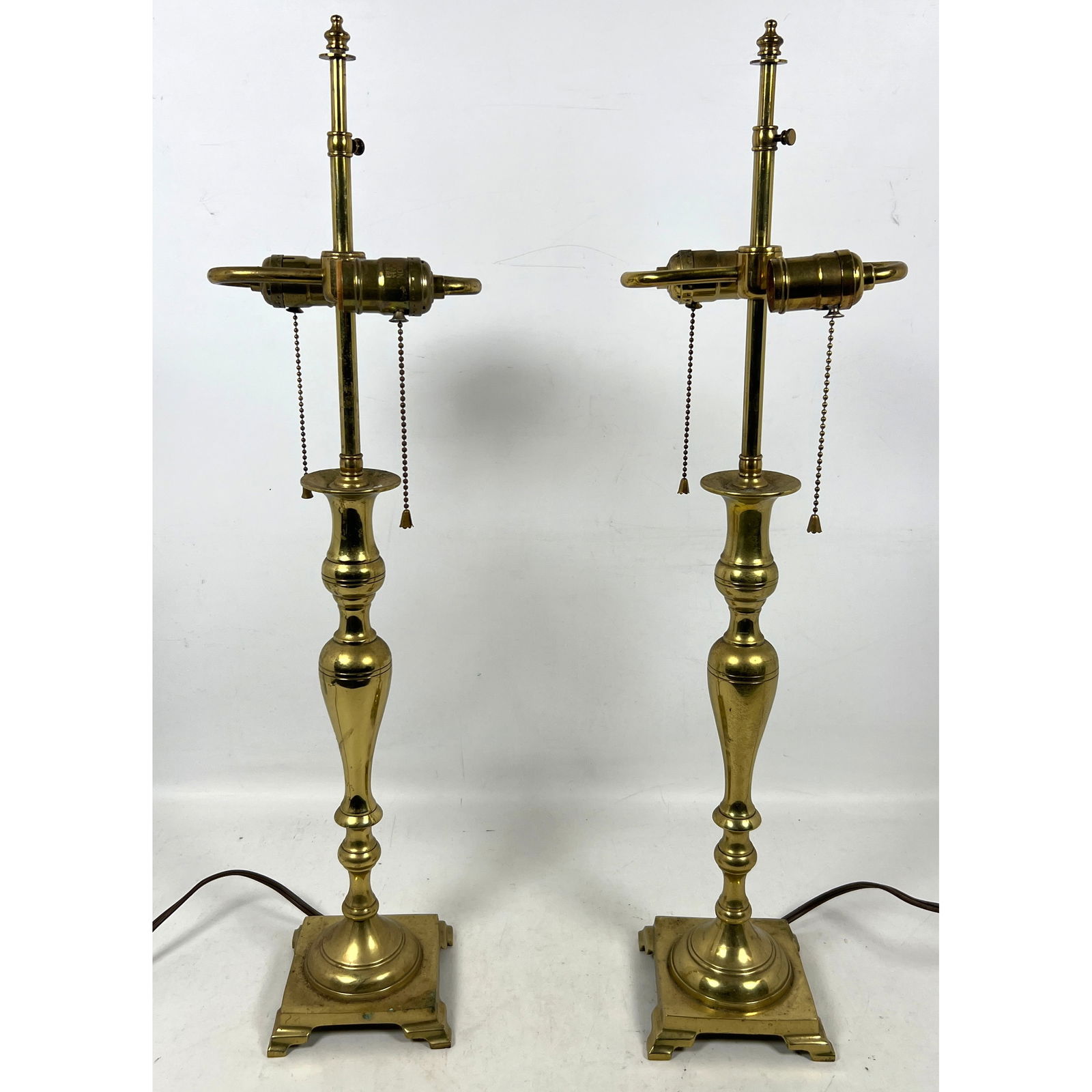 Vintage English Solid Brass Candlestick Table Lamps: Vintage English Solid Brass Candlestick Table Lamps Dimensions: Height: 28 inches, Width: 5.5 inches, Depth: 5.5 inches. --- US Packing and Shipping charge: In house shipping available. Will be calcul