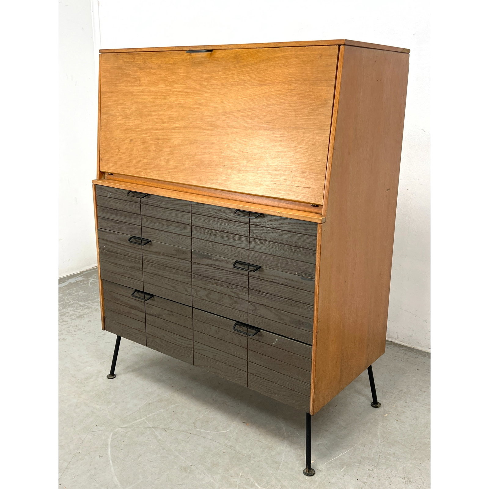 Raymond Loewy for Mengel Furniture. Fall Front Desk Dresser Cabinet. Metal legs.: Raymond Loewy for Mengel Furniture. Fall Front Desk Dresser Cabinet. Metal legs. Dimensions: Height: 47 inches, Width: 36.25 inches, Depth: 19.5 inches. ---