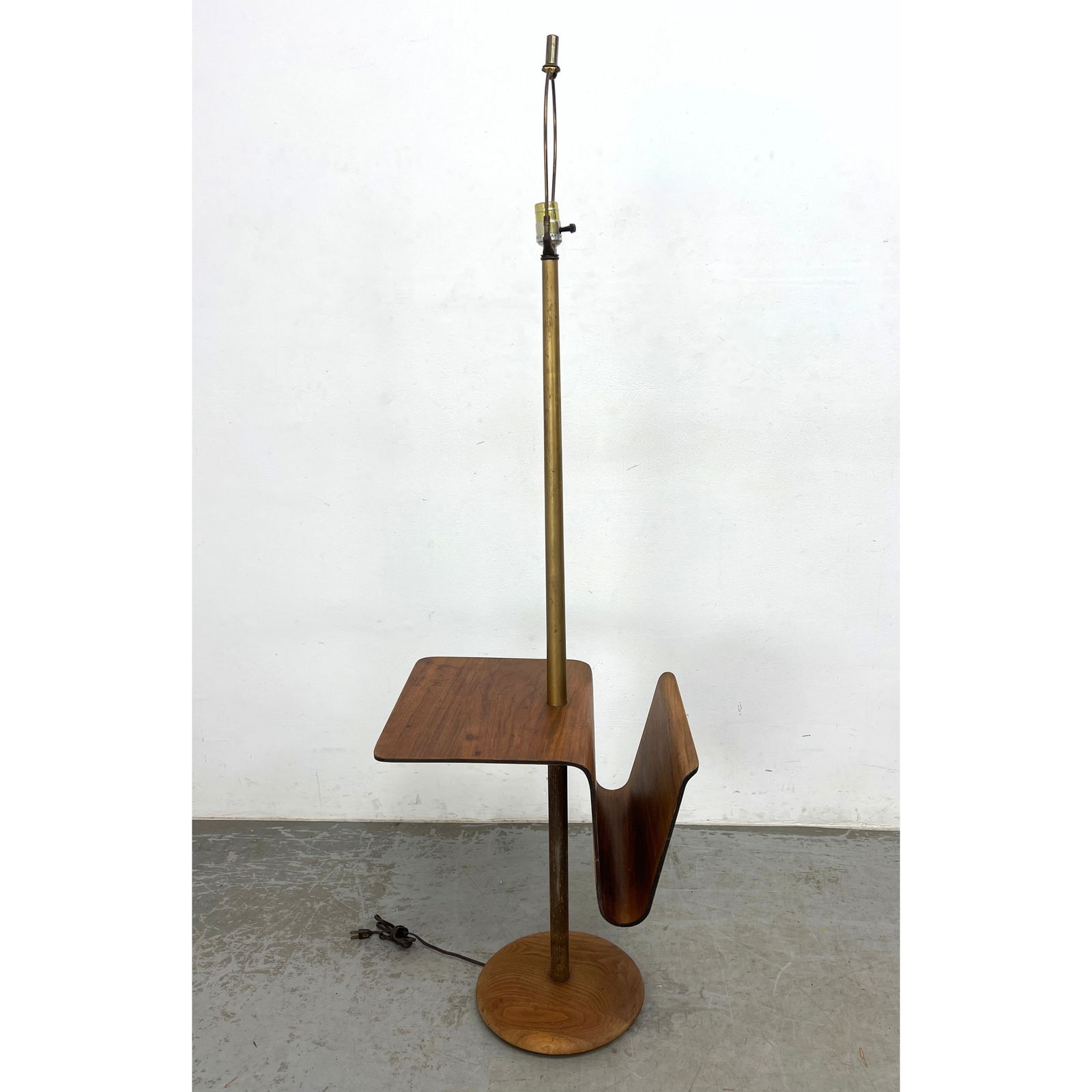 60s Vintage Mid Century Laurel Lamp Company Bentwood Teak Table and Magazine Rack Floor Lamp: 60s Vintage Mid Century Laurel Lamp Company Bentwood Teak Table and Magazine Rack Floor Lamp Dimensions: Height: 60 inches, Width: 15 inches, Depth: 18.25 inches. ---