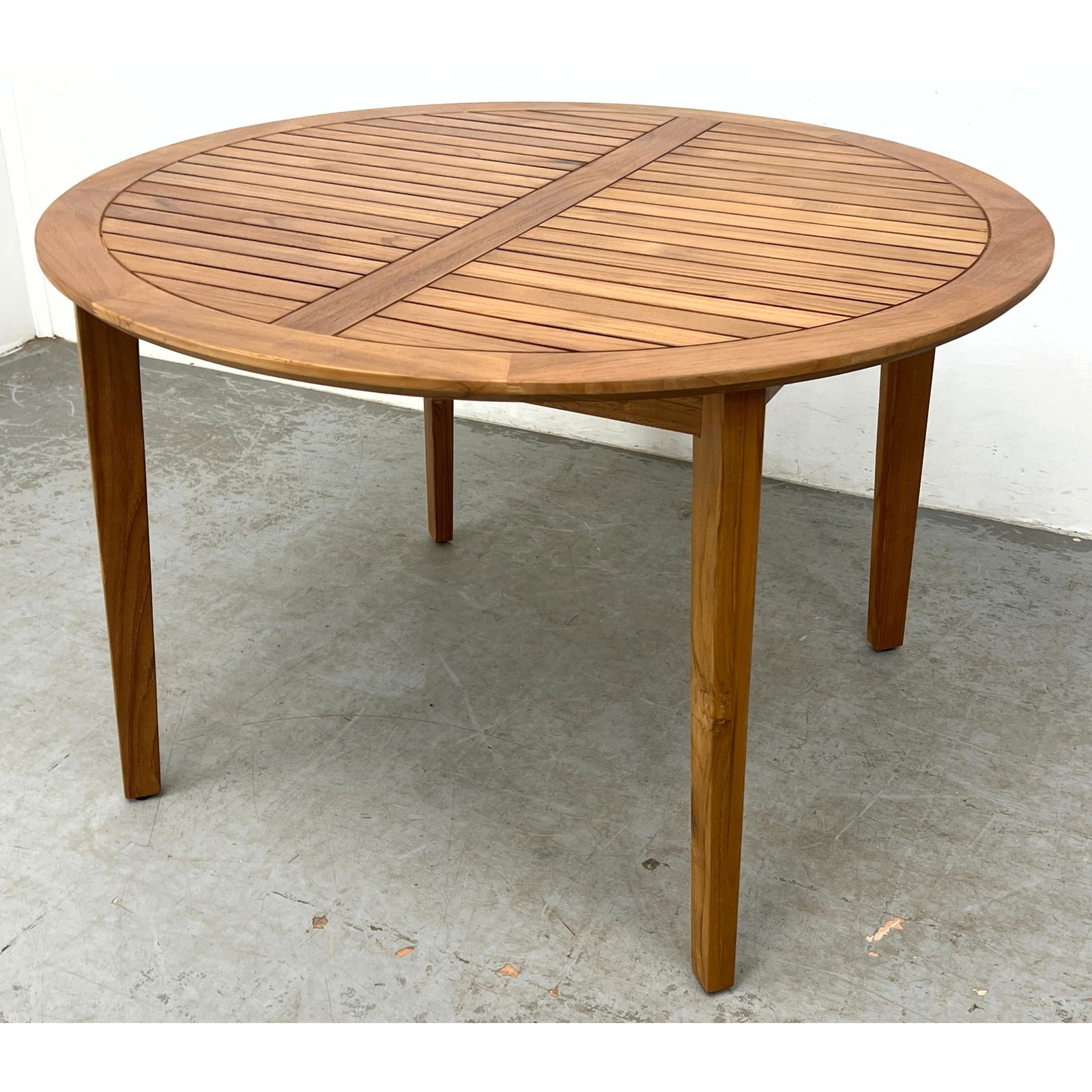 Teak Outdoor Garden Patio Dining Table. Rounded Banded Form with Teak Slat Top. Tapered Teak Legs. A: Teak Outdoor Garden Patio Dining Table. Rounded Banded Form with Teak Slat Top. Tapered Teak Legs. Article tag. Garden, Deck. Dimensions: Height: 30 inches, Width: 47.25 inches, Depth: 47.25