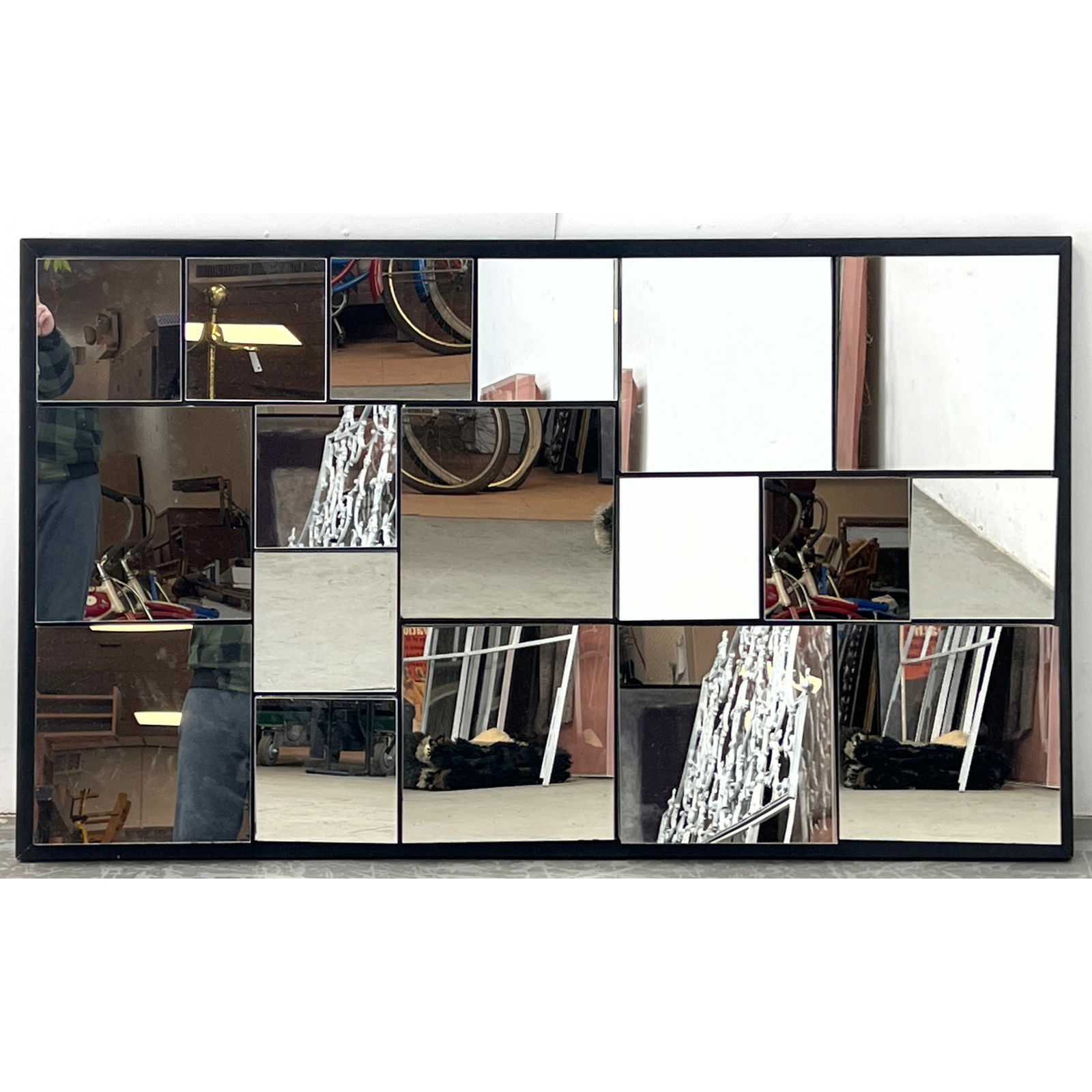 Large Neal Small Attributed Faceted Wall Mirror.: Large Neal Small Attributed Faceted Wall Mirror. Dimensions: Height: 35 inches, Width: 59 inches, Depth: 3 inches. ---