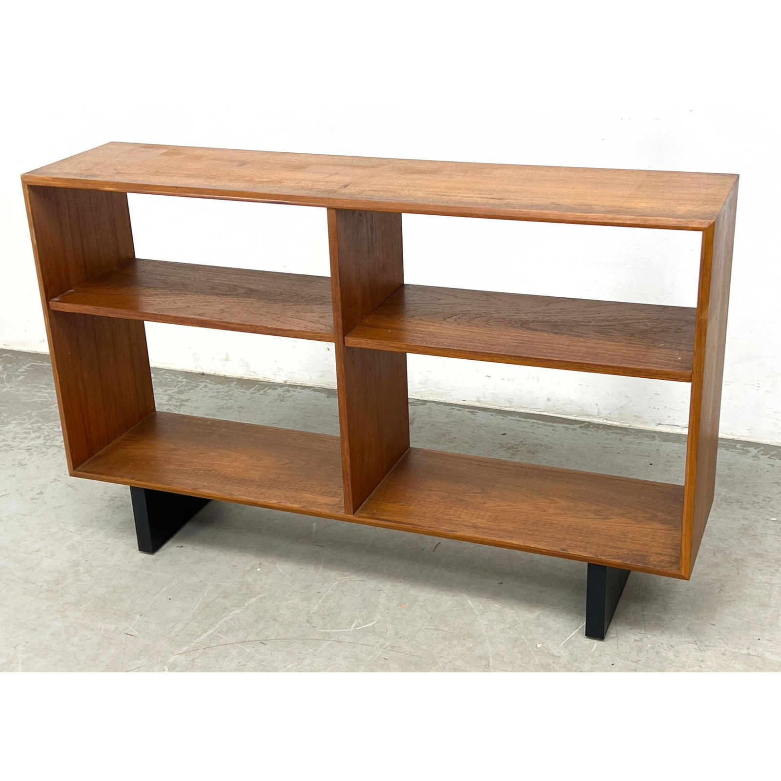 Mid Century Modern Open Bookcase with Ebonized legs.: Mid Century Modern Open Bookcase with Ebonized legs. Dimensions: Height: 30.5 inches, Width: 48 inches, Depth: 12 inches. ---