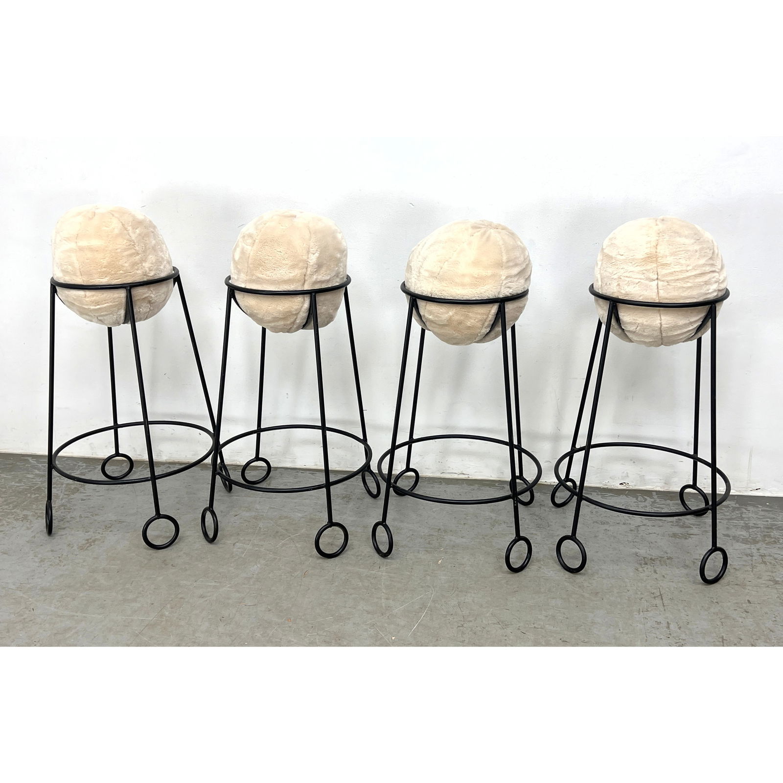 Set of 4 Heavy Iron Bar Stools After Jean Royere with soft Ball Cushions.: Set of 4 Heavy Iron Bar Stools After Jean Royere with soft Ball Cushions. Dimensions: Height: 30 inches, Width: 22 inches, Depth: 22 inches. ---