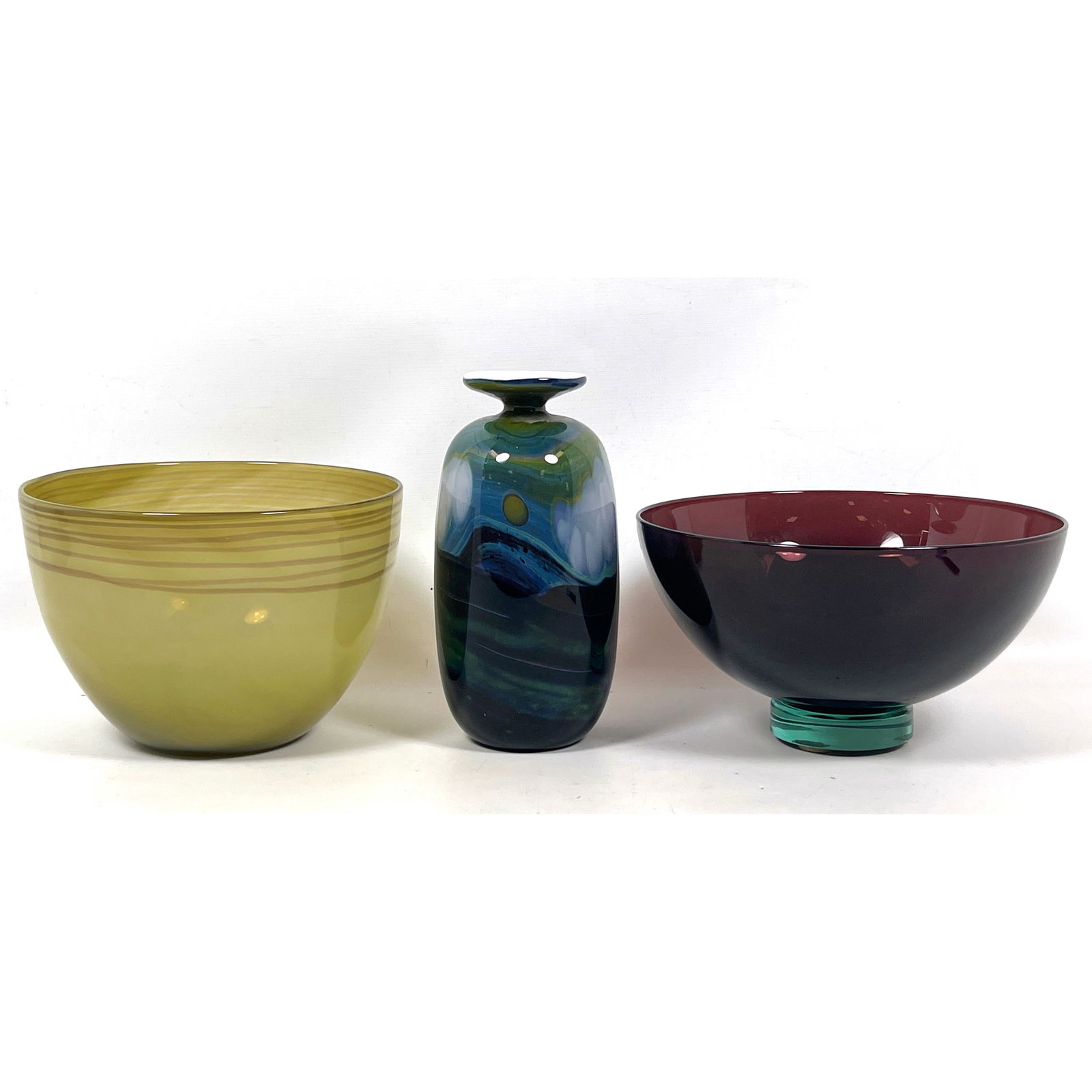 3pc studio art glass vessels. Royal Copenhagen Anja Kjaer Footed Bowl has Paper Label. 2) Signed Art: 3pc studio art glass vessels. Royal Copenhagen Anja Kjaer Footed Bowl has Paper Label. 2) Signed Art Glass Vase With Flared Lip; Signed Illegibly (?????? Glassworks) 3) Yellow Green Bowl with Decorati