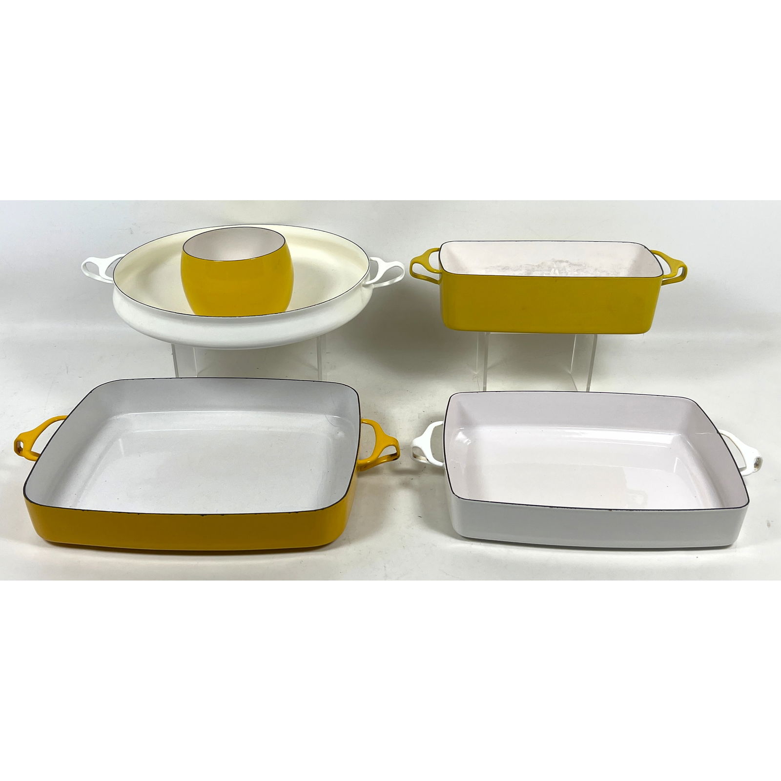 Collection 5pc DANSK Kobenstyle Enamel Cook Ware. Paella Pan. 3 Baking Dishes. Small Bowl. Yellow or: Collection 5pc DANSK Kobenstyle Enamel Cook Ware. Paella Pan. 3 Baking Dishes. Small Bowl. Yellow or White Enamel. Marked. Dimensions: Height: 3 inches, Width: 17 inches, Depth: 13.5 inches. --- US Pa