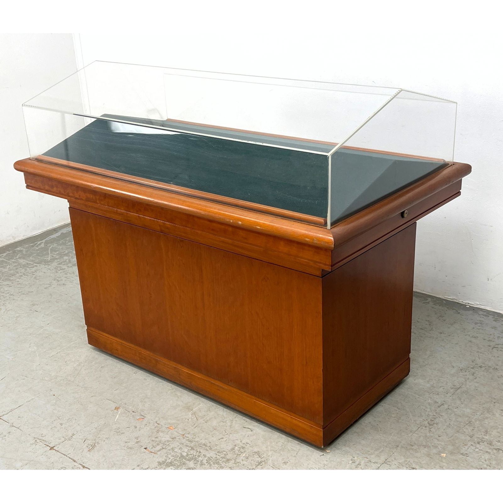 Large Wood Base Museum style Display Case #2. Slanted Lucite Cover above Angled Felt Display. no key: Large Wood Base Museum style Display Case #2. Slanted Lucite Cover above Angled Felt Display. no key Dimensions: Height: 44 inches, Width: 56 inches, Depth: 32.25 inches. ---