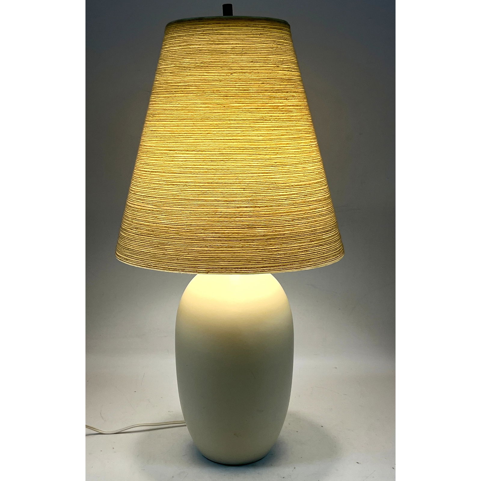 Danish Modern Gunnar and Lotte Bostlund Glazed Ceramic Table Lamp with Rope wrapped Fiberglass Shade: Danish Modern Gunnar and Lotte Bostlund Glazed Ceramic Table Lamp with Rope wrapped Fiberglass Shade. Dimensions: Height: 25 inches, Width: 12 inches, Depth: 12 inches. ---