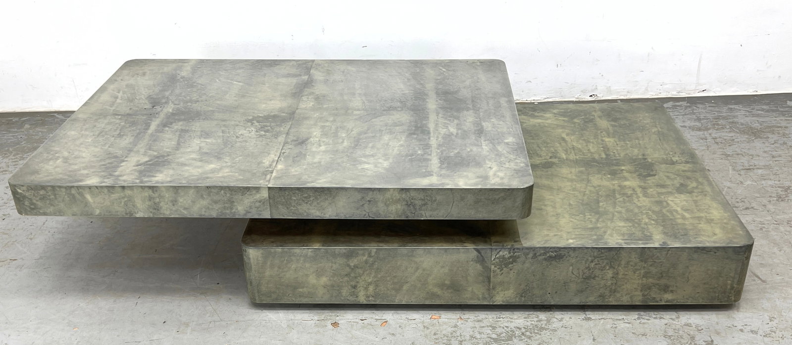 Aldo Tura Attributed Goat Skin Sliding Top Coffee Table. Springer style.: Aldo Tura Attributed Goat Skin Sliding Top Coffee Table. Springer style. Dimensions: Height: 12 inches, Width: 48 inches, Depth: 35.5 inches. ---