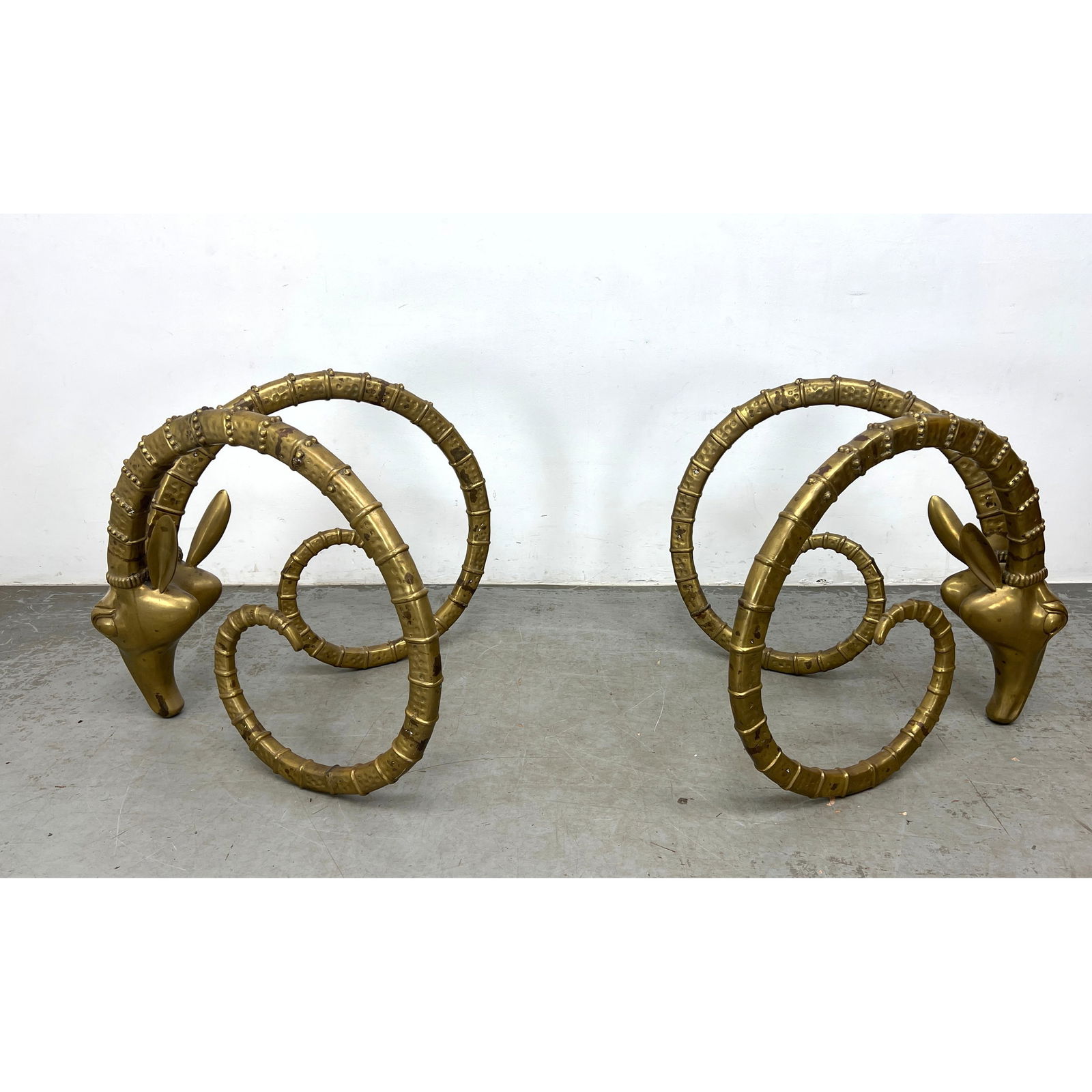 Pair Large Leon Francois Chervet Ibex Ram's Head Dining Table Bases. Good Quality Heavy Construction: Pair Large Leon Francois Chervet Ibex Ram's Head Dining Table Bases. Good Quality Heavy Construction. Unmarked. Dimensions: Height: 29.5 inches, Width: 32 inches, Depth: 32 inches. ---