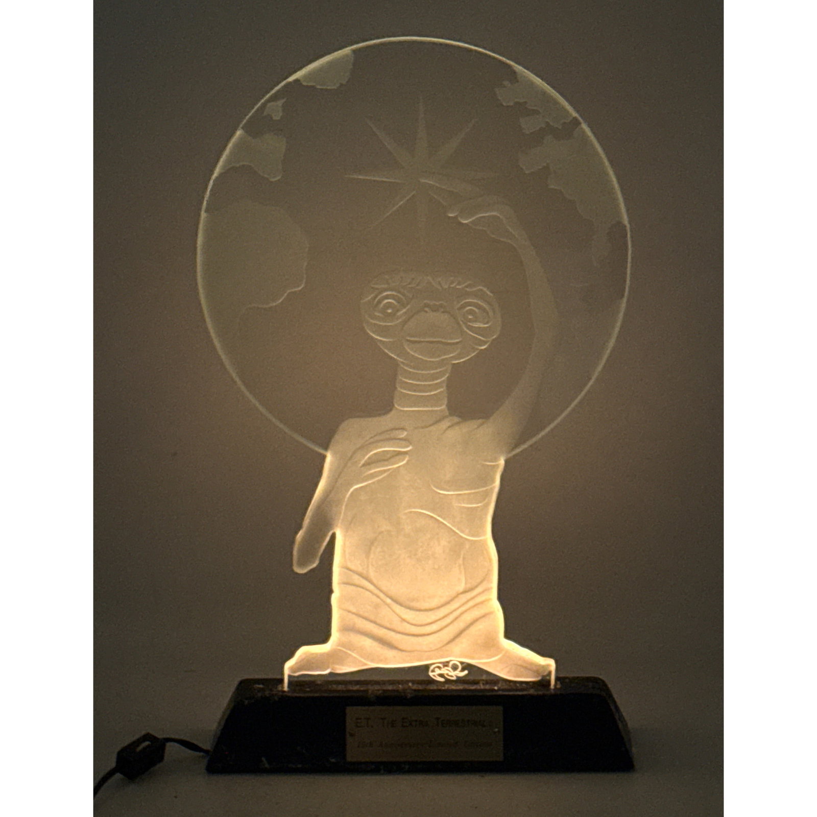 Etched glass E.T. the Extra-Terrestrial from the movie on lighted stand in original box with origin: Etched glass E.T. the Extra-Terrestrial from the movie on lighted stand in original box with original paperwork and authenticity. E.T. the Extra-Terrestrial Purchased from Universal Studios and remain