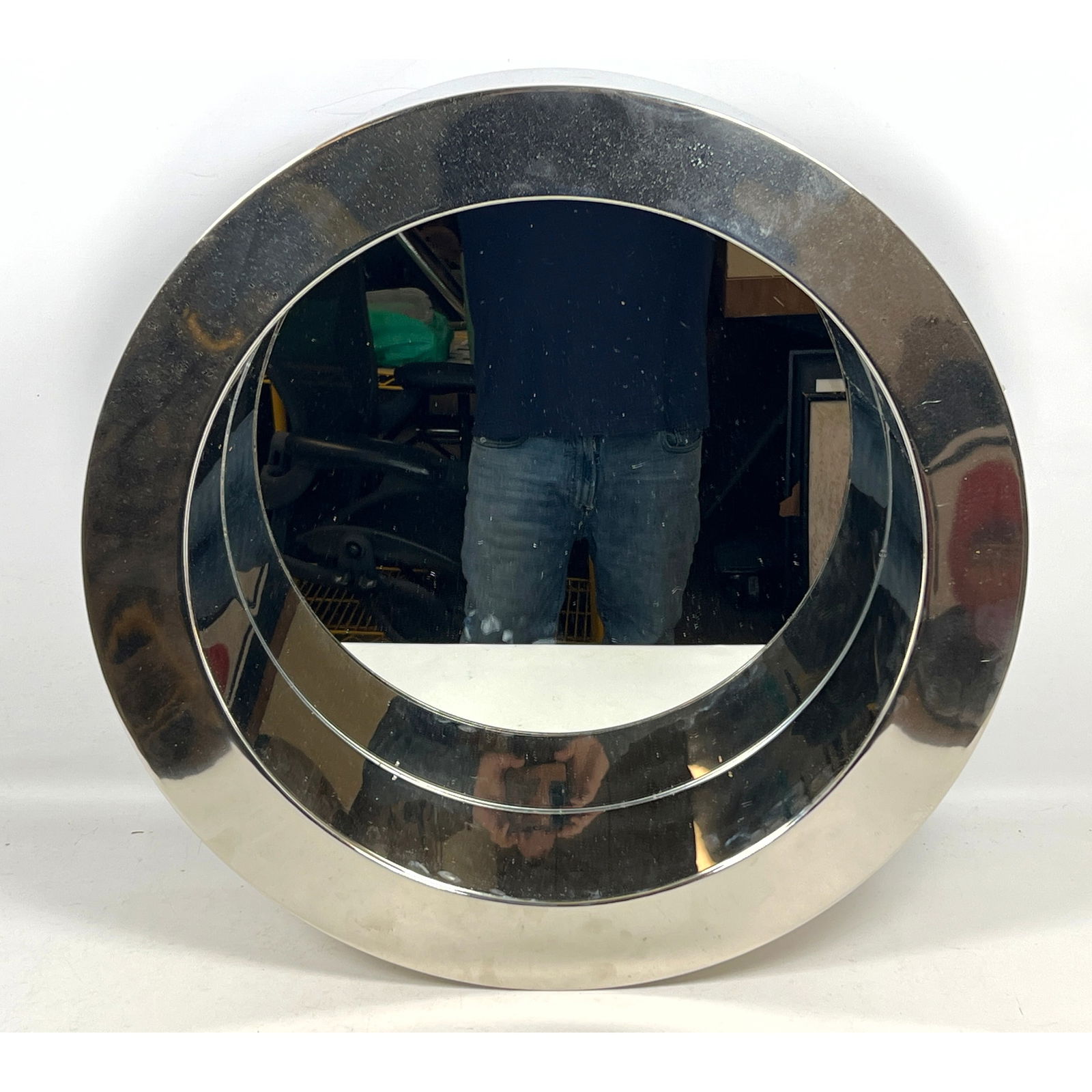 Jere Style Port Hole Wall Mirror. Wide deep chrome frame.: Jere Style Port Hole Wall Mirror. Wide deep chrome frame. Dimensions: Height: 23.5 inches, Width: 23.5 inches, Depth: 6 inches. ---