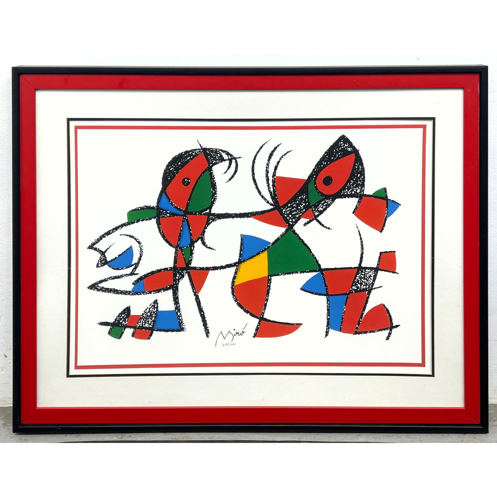 After Joan Miro Print. Primary Color Modernist Images. Pencil Edit Number 69/300. "Lithographe Serie: After Joan Miro Print. Primary Color Modernist Images. Pencil Edit Number 69/300. "Lithographe Series" Dimensions: Frame Height: 29.25 inches, Frame Width: 38 inches. - Image Size: Image Height: