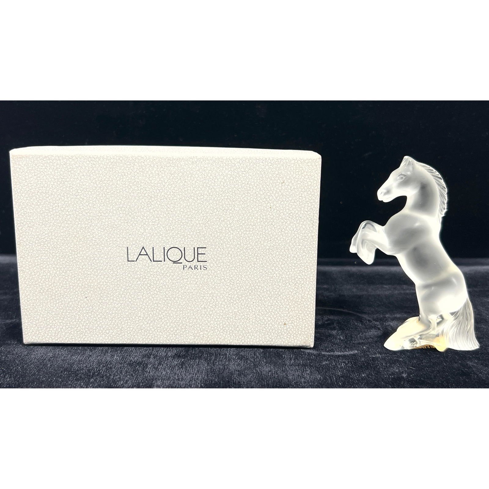 LALIQUE France Crystal Rearing Horse Figure. Original box and card. Frosted crystal. Signed.: LALIQUE France Crystal Rearing Horse Figure. Original box and card. Frosted crystal. Signed. Dimensions: Height: 4.75 inches, Width: 1.5 inches, Depth: 2 inches. ---