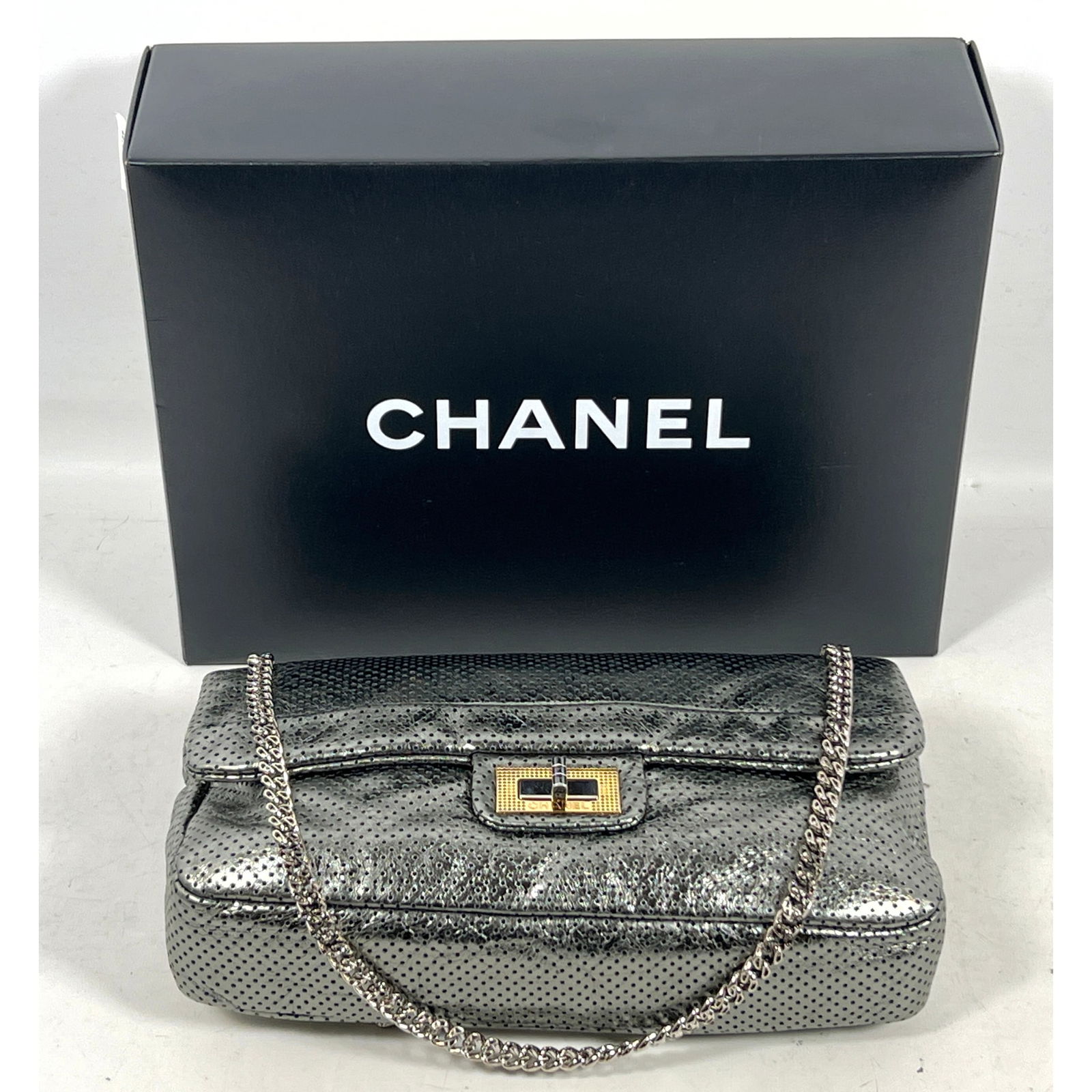 Chanel 2.55 Flap Bag Purse. Perforated Drill Model. Constructed from metallic gunmetal aged calfskin (1 of 12)