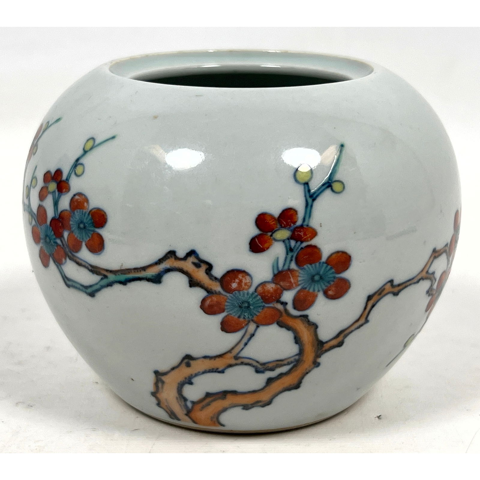 Chinese globular porcelain water pot or small jar decorated in the doucai style with blossoming plum (1 of 9)