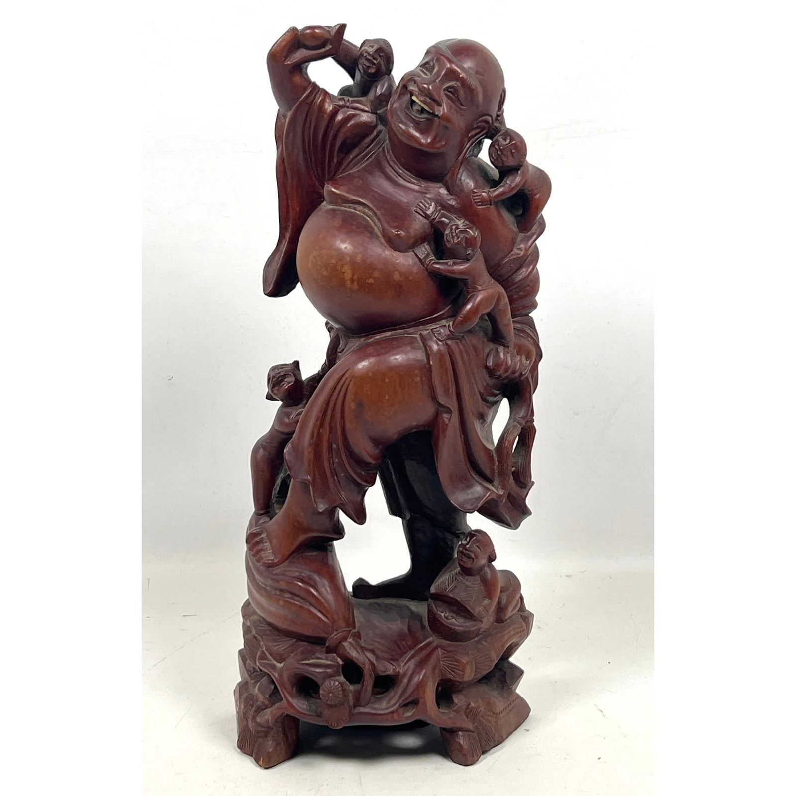 Hand-carved hardwood sculpture depicting the Laughing Buddha, Budai, (1 of 11)