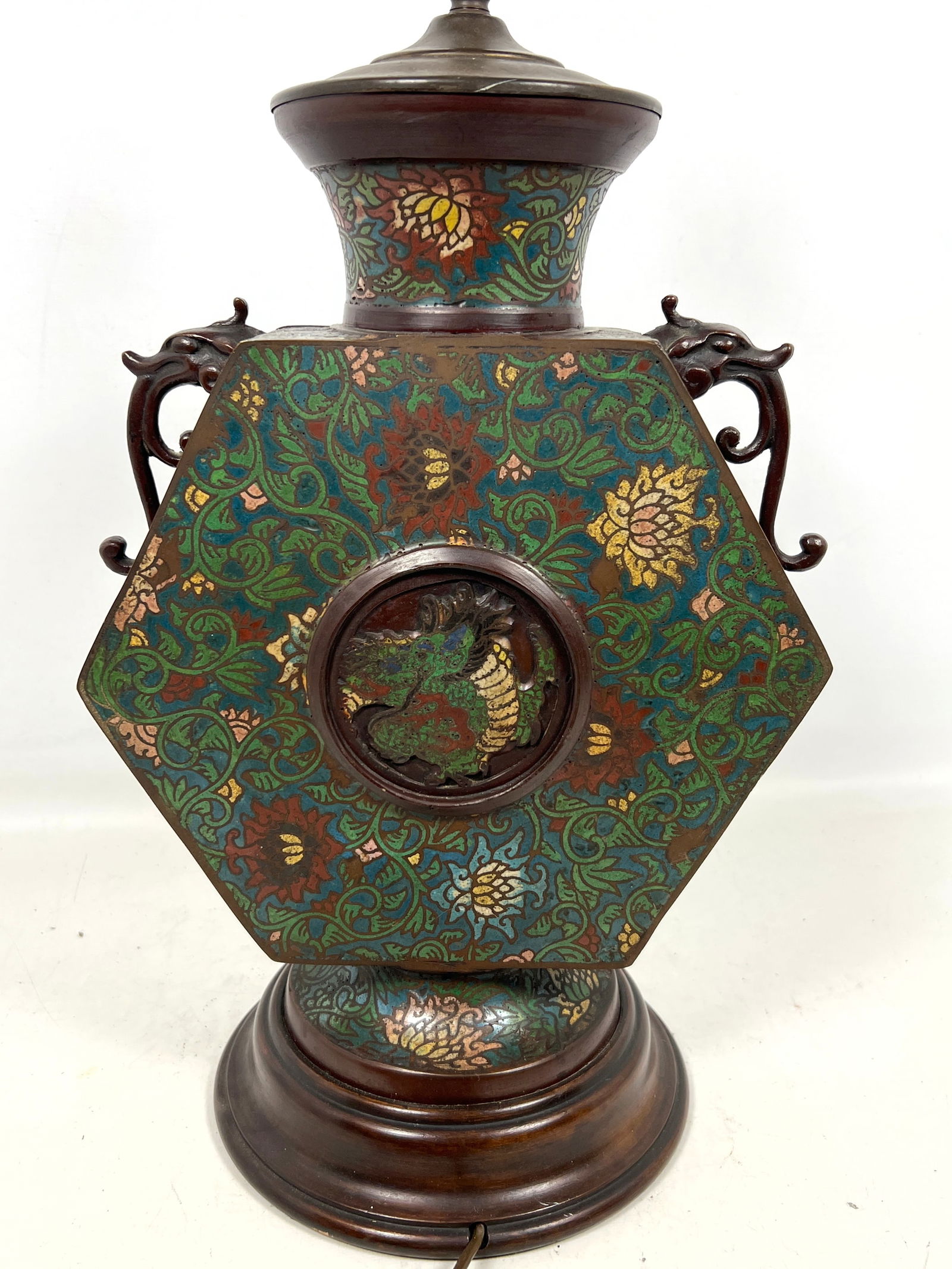 Chinese Champleve Enamel Table Lamp. Fattened hexagonal vessel decorated with Chinoiserie-style cloi: Chinese Champleve Enamel Table Lamp. Fattened hexagonal vessel decorated with Chinoiserie-style cloisonne enamel. Dimensions: Height: 30 inches, Width: 11 inches, Depth: 4 inches. ---