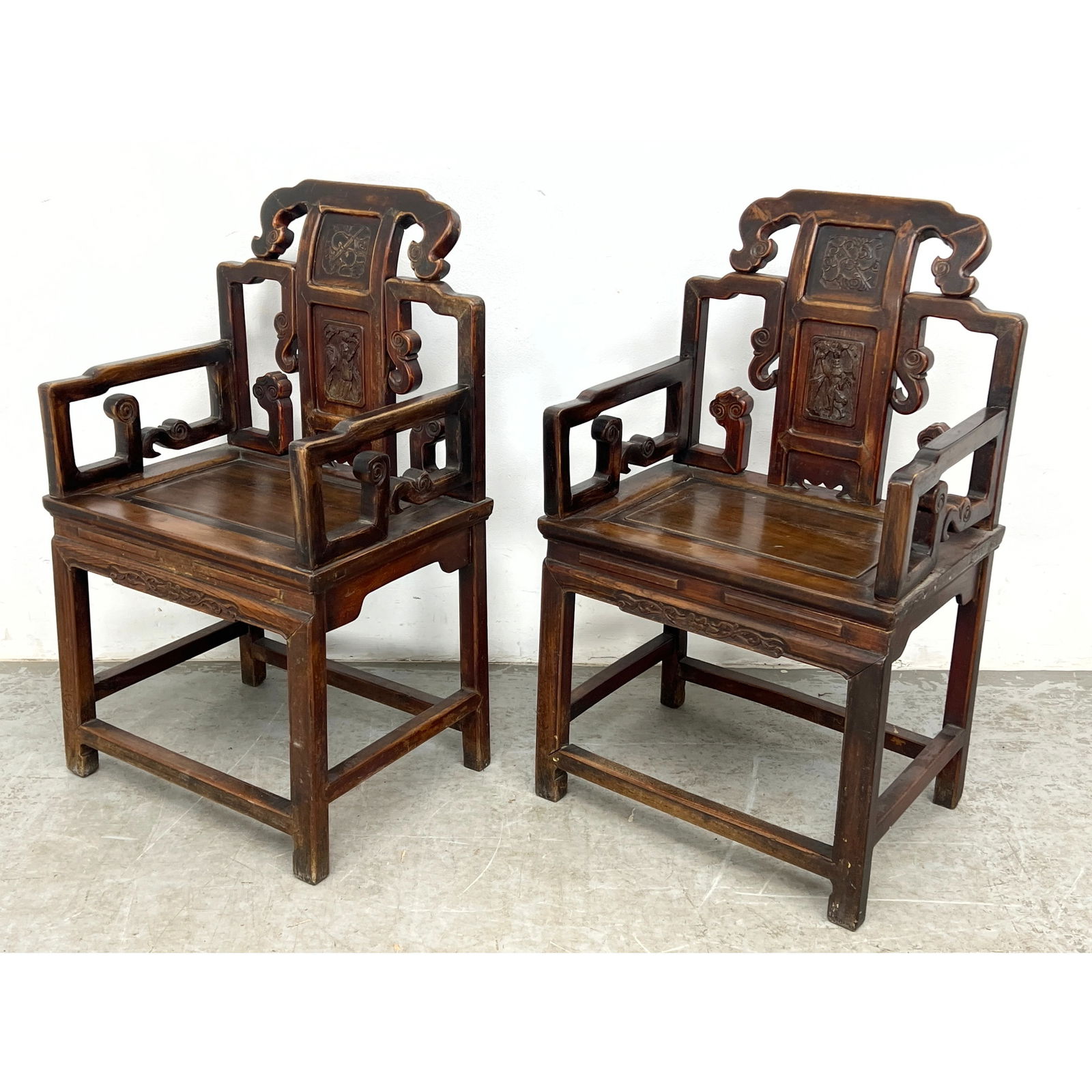 Pair of Chinese carved hardwood armchairs in the Qing Dynasty style: Pair of Chinese carved hardwood armchairs in the Qing Dynasty style Dimensions: Height: 37 inches, Width: 22 inches, Depth: 17 inches. - Seat Height: 19.5 inches ---