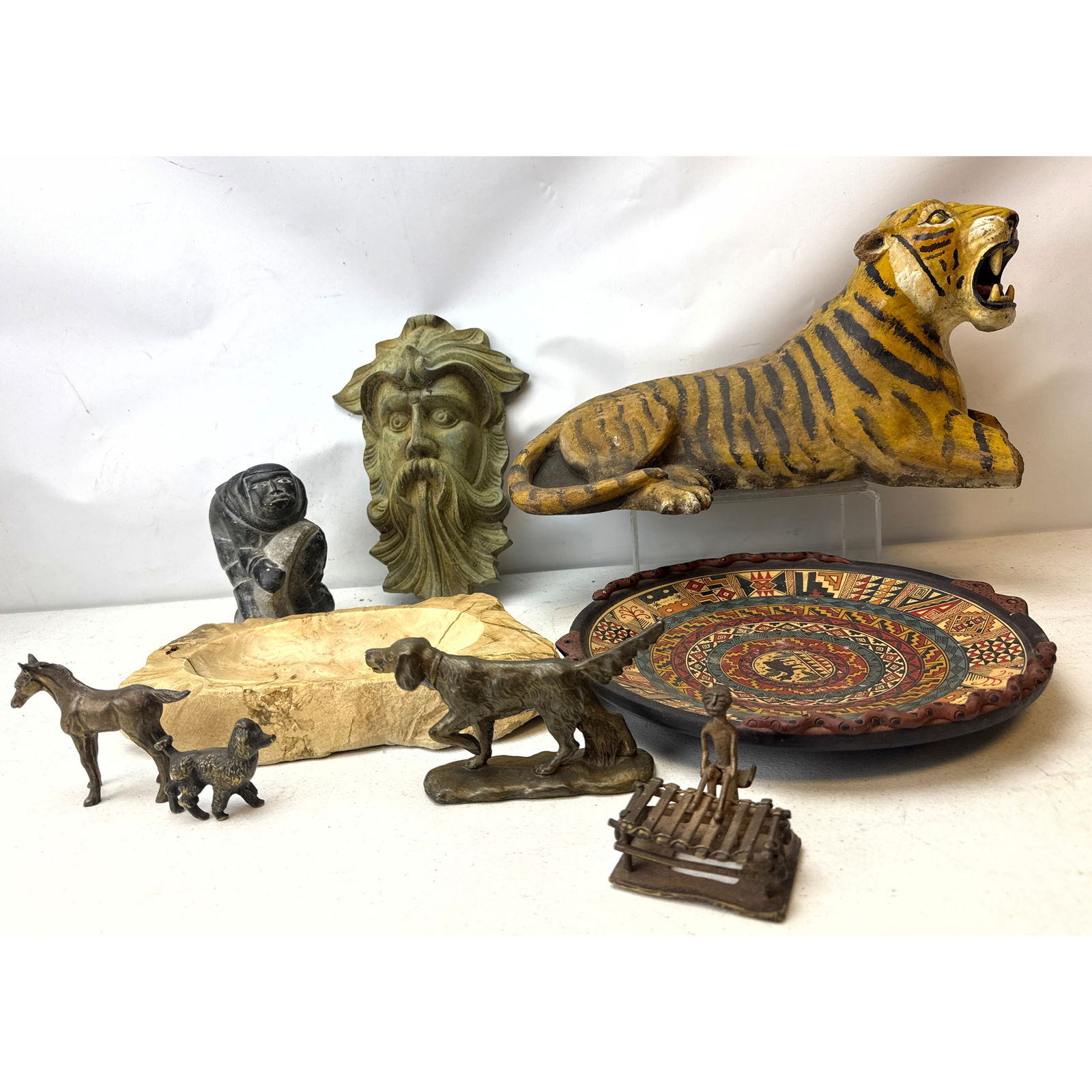 This collection features a variety of international folk art and decorative objects. Included is Pai (1 of 20)